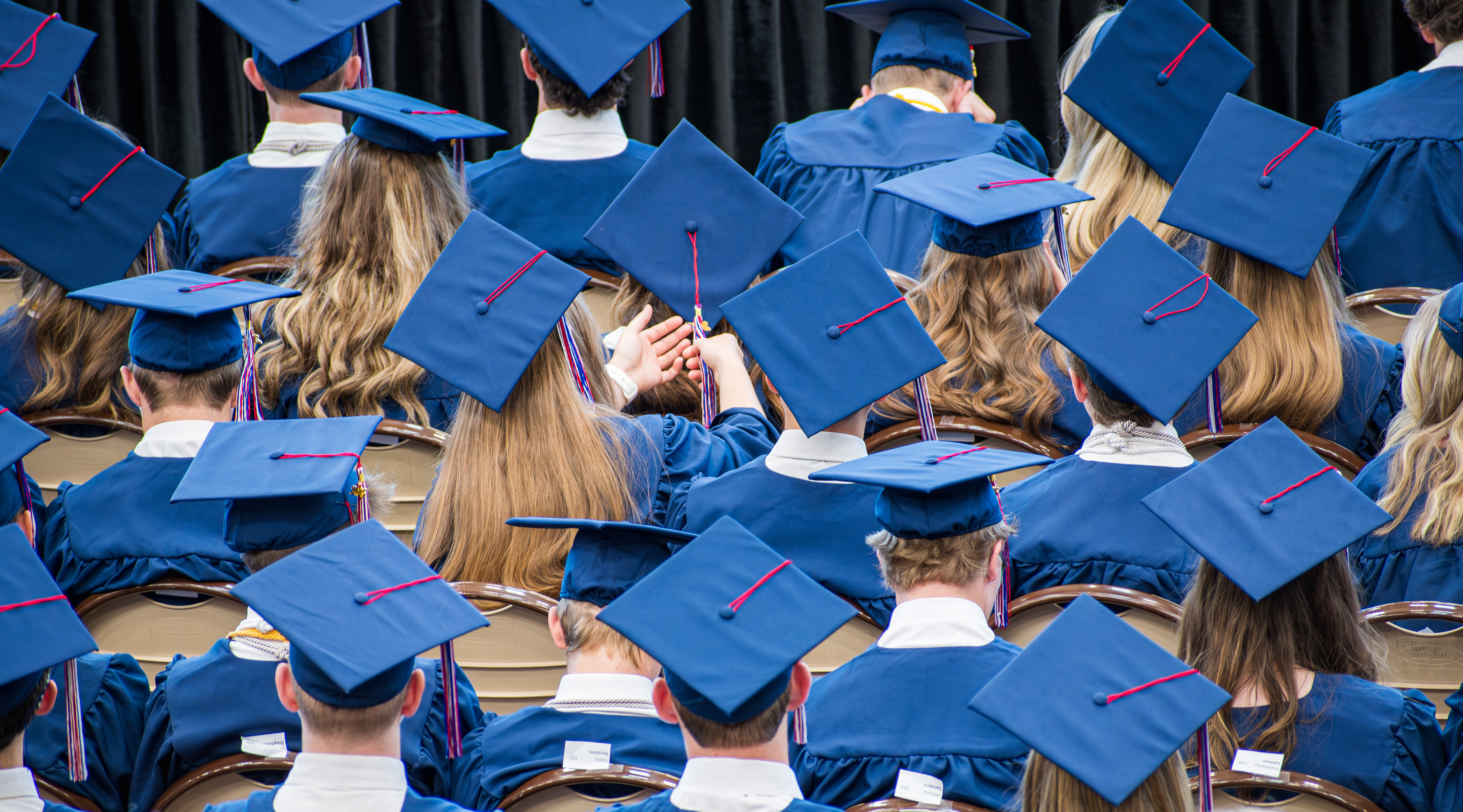 AMERICAN FORK, UT, USA – MAY 24, 2025: Students wearing graduation caps gather at a school in American Fork, Utah, celebrating their achievements and marking the milestone of completing their studies.