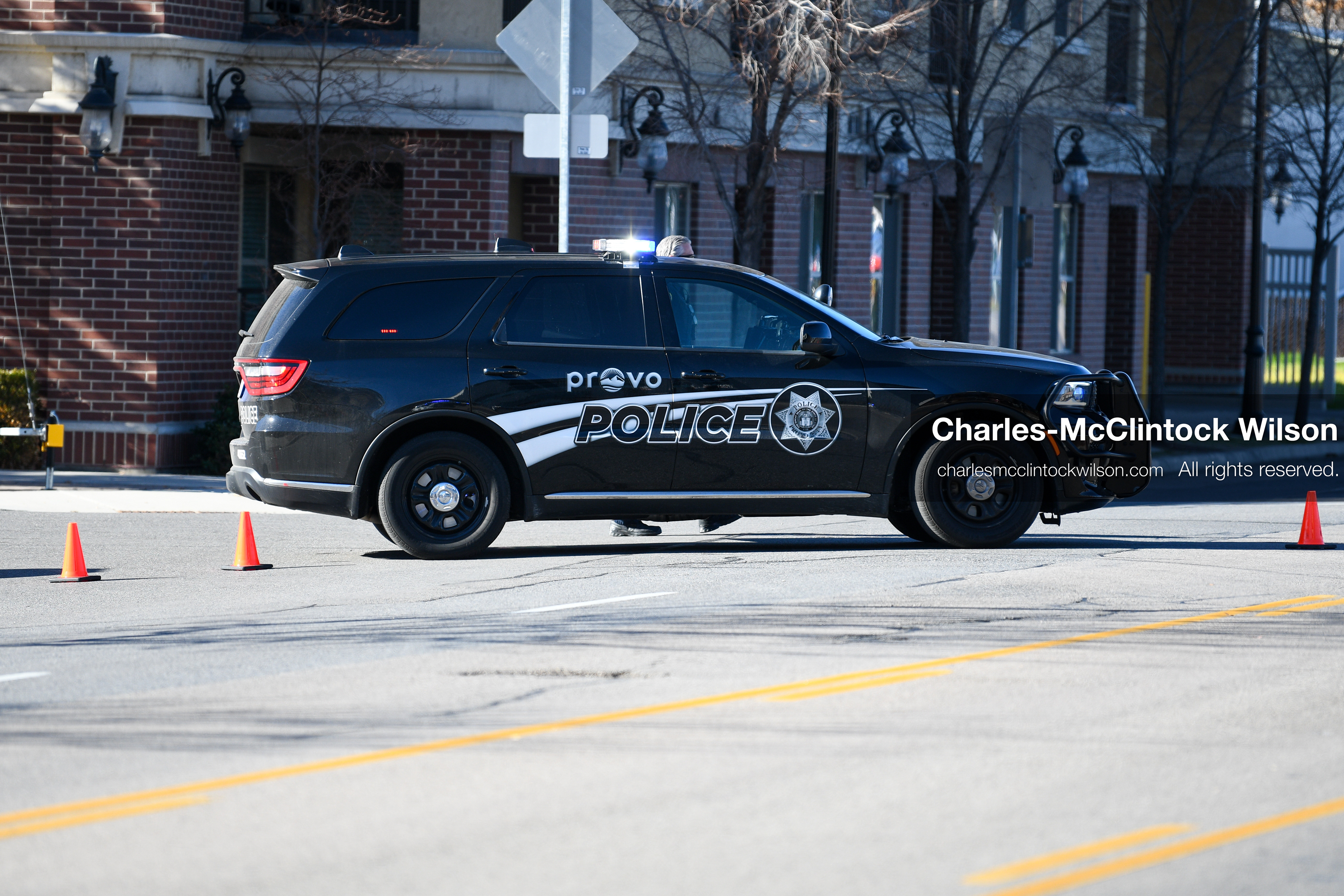PROVO, UTAH, USA – DECEMBER 11, 2025: A Provo Police cruiser blocks the road near the Fourth District Court in Provo during the first in‑person court appearance of Tyler Robinson in the Charlie Kirk murder case. (Credit Image: © Charles‑McClintock Wilson/ZUMA Press Wire)