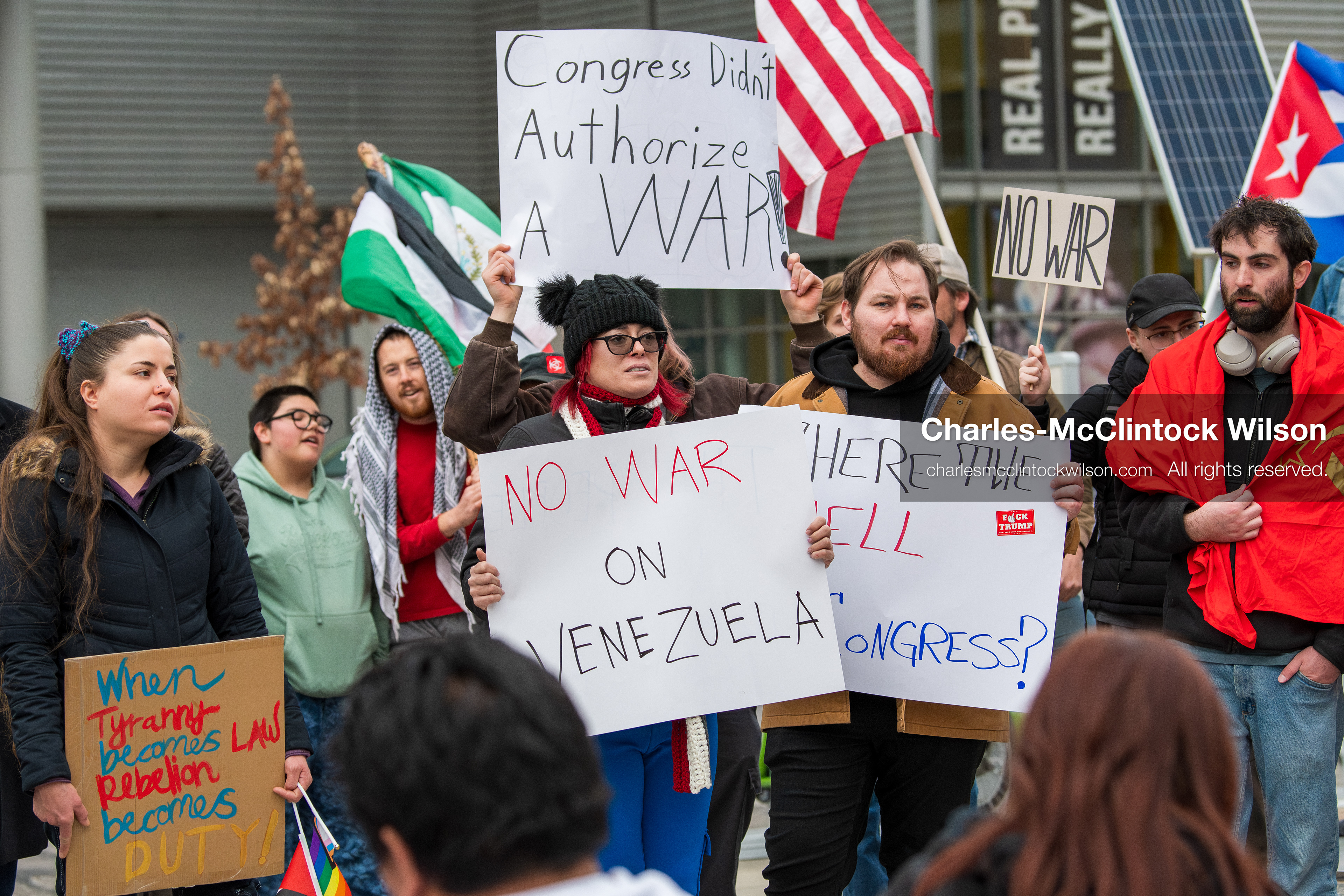 January 3, 2026, Salt Lake City, Utah, USA: Protesters hold signs during an emergency demonstration against US action in Venezuela outside the Wallace Federal Building in Salt Lake City, Utah. The event was part of a nationwide mobilization responding to recent military developments. (Credit Image: (c) Charles‑McClintock Wilson/ZUMA Press Wire)