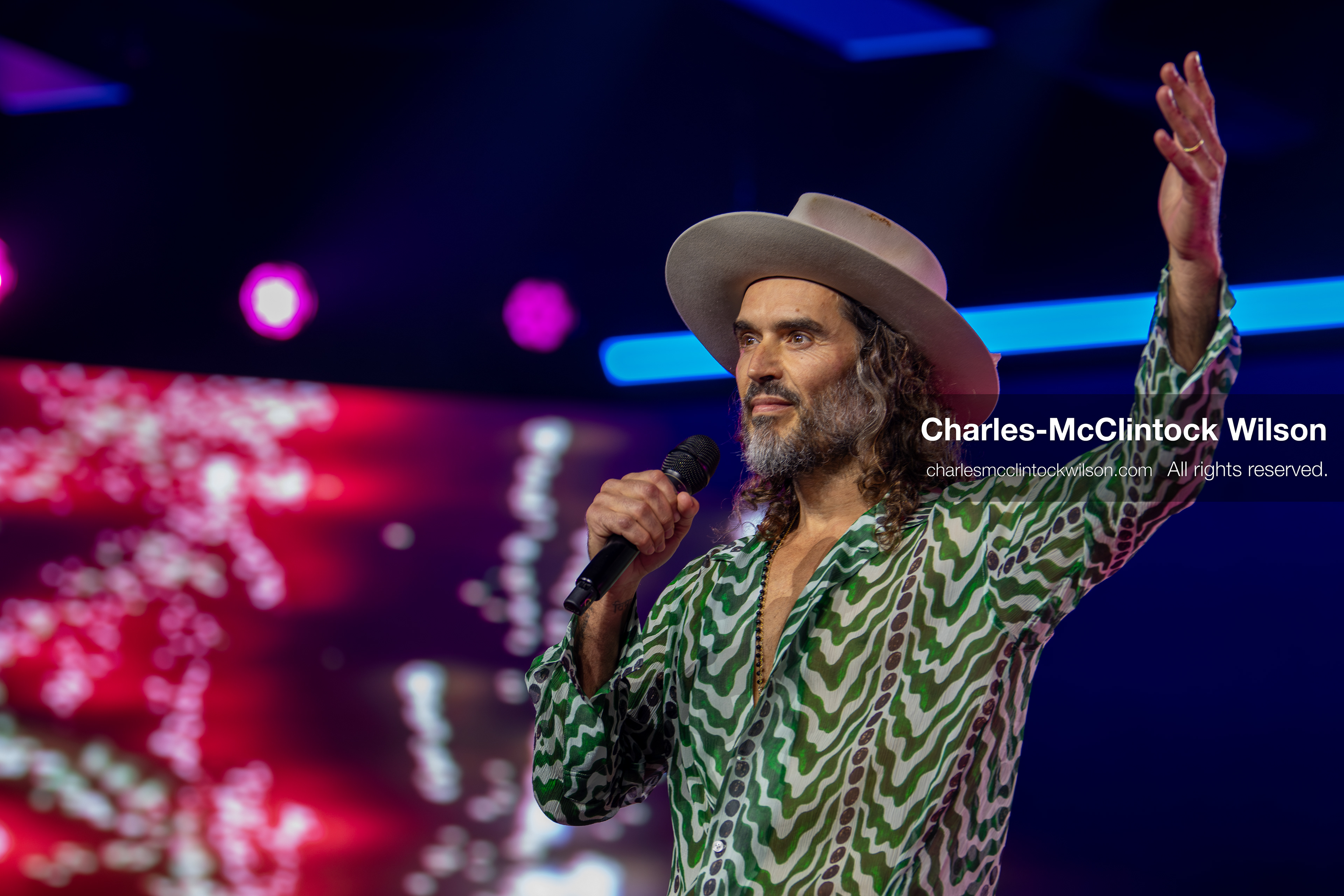 December 18, 2025, Phoenix, Arizona, USA: Russell Brand speaks during Day One of Turning Point USA’s AmericaFest 2025 at the Phoenix Convention Center in Phoenix, Arizona.   (Credit Image: © Charles‑McClintock Wilson/ZUMA Press Wire)