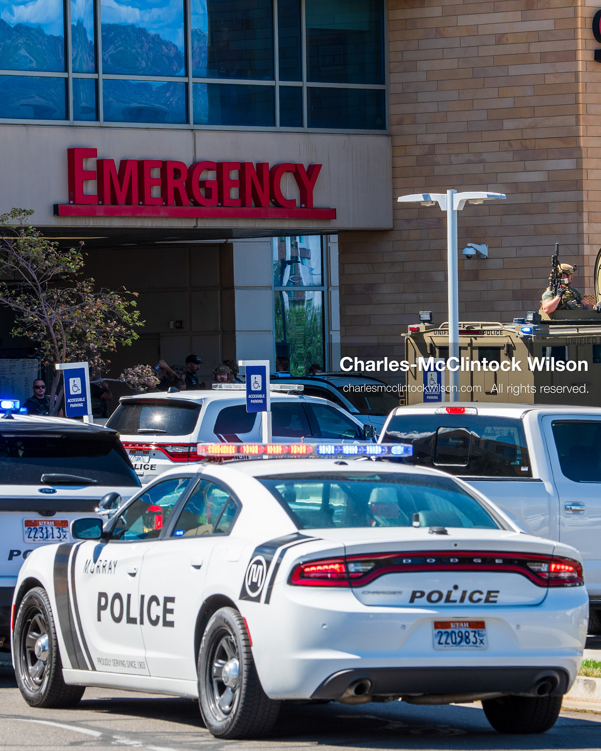 August 17, 2026, Murray, Utah, USA: Multiple law enforcement vehicles and an armored tactical vehicle stand outside the emergency department entrance at Intermountain Medical Center in Murray, Utah, on Monday. Multiple police agencies secured the hospital perimeter as a safety precaution after shooting victims were brought in from a fatal shootout outside a funeral in nearby Kearns. (Credit Image: © Charles McClintock Wilson/ZUMA Press Wire)