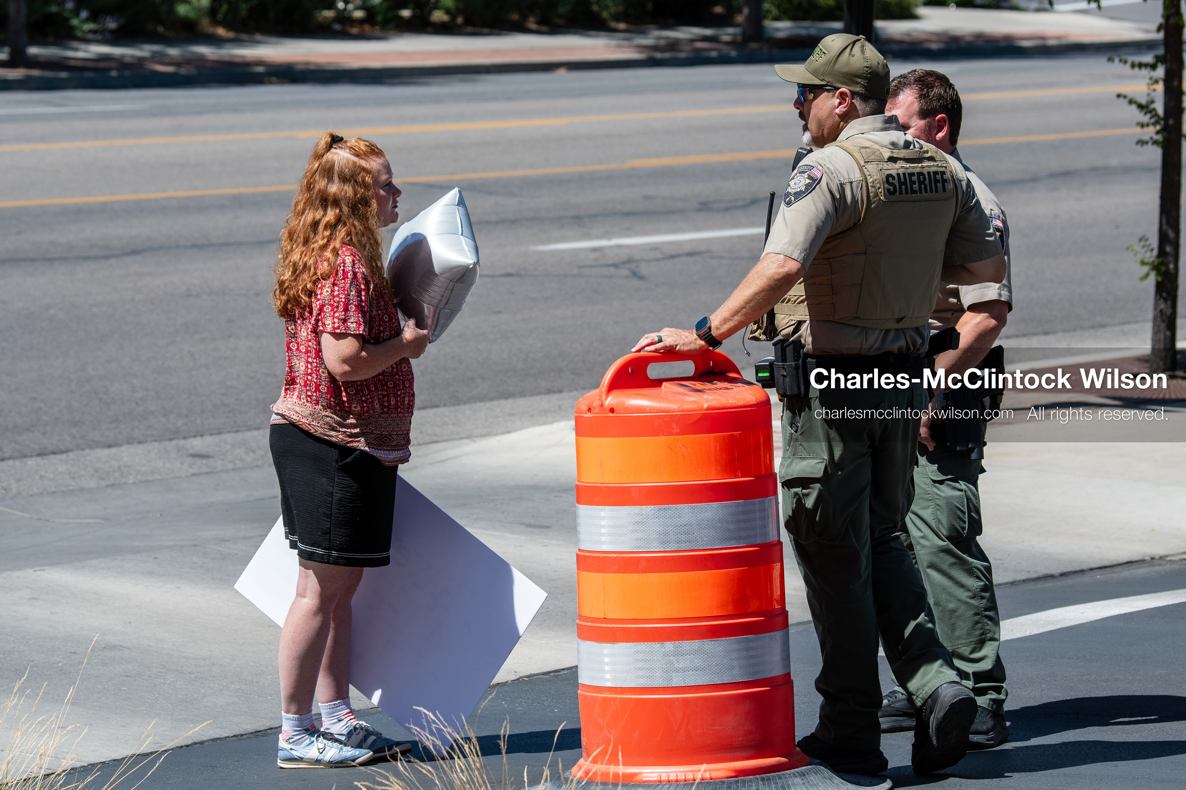 July 8, 2026, Provo, Utah, USA: SYDNEY YOUNG speaks with Utah County Sheriff’s Office deputies outside the Fourth District Court in Provo during the third day of the preliminary hearing in the Tyler Robinson case. Prosecutors are continuing to present evidence to determine whether probable cause exists for the case to proceed to trial after Charlie Kirk was fatally shot at Utah Valley University in 2025. (Credit Image: © Charles-McClintock Wilson/ZUMA Press Wire)