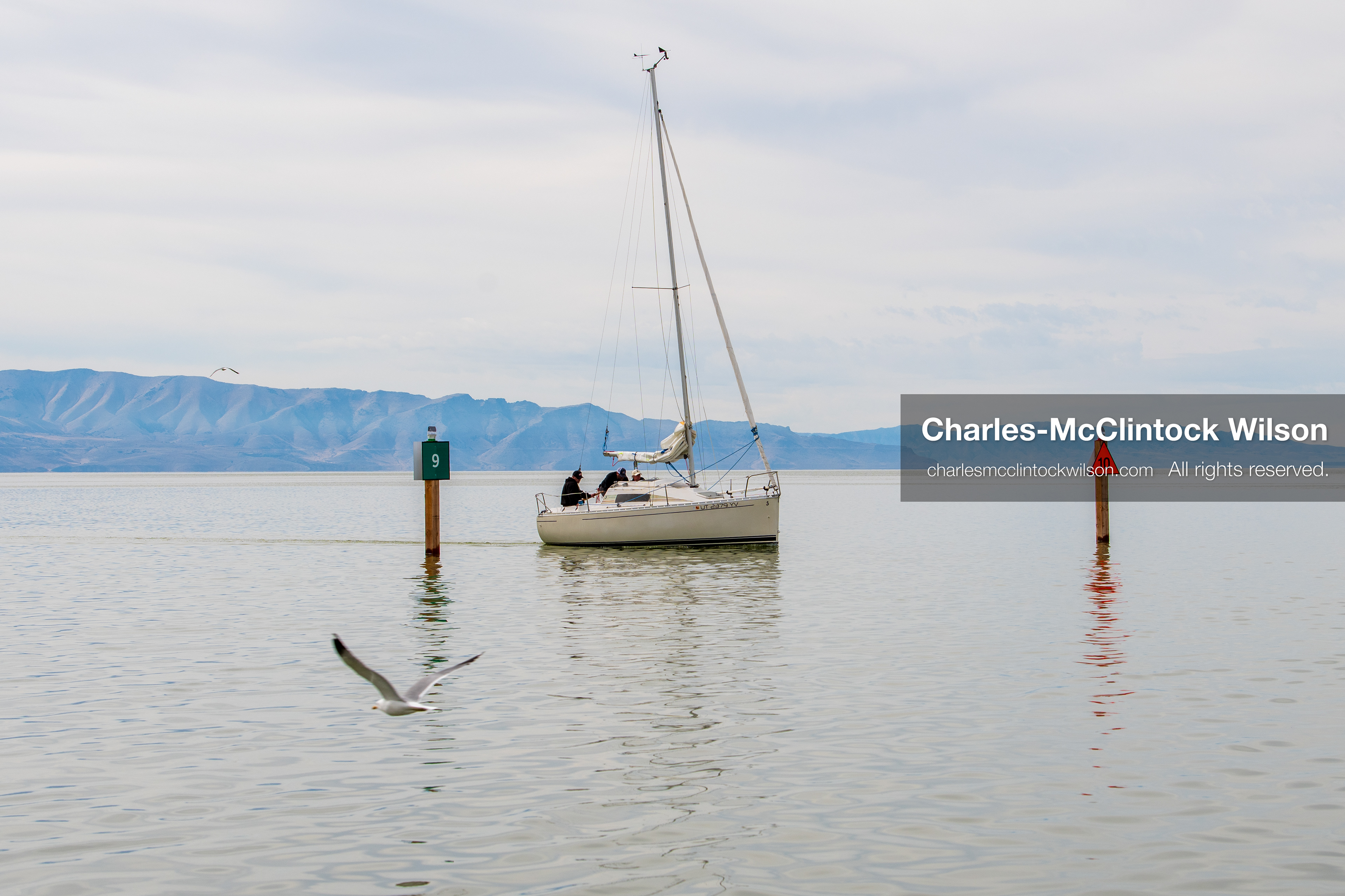 March 1, 2026, Great Salt Lake, Utah, USA: A sailboat moves across calm water at the Great Salt Lake as the region continues to experience historically low water levels. Reports from state officials and the Great Salt Lake Strike Team state that the lake remains in a serious adverse‑effects range, with elevations among the lowest recorded in more than one hundred years. The lake has drawn increased public attention as lawmakers consider large‑scale water projects and long‑term plans to address declining conditions. (Credit Image: © Charles‑McClintock Wilson/ZUMA Press Wire)