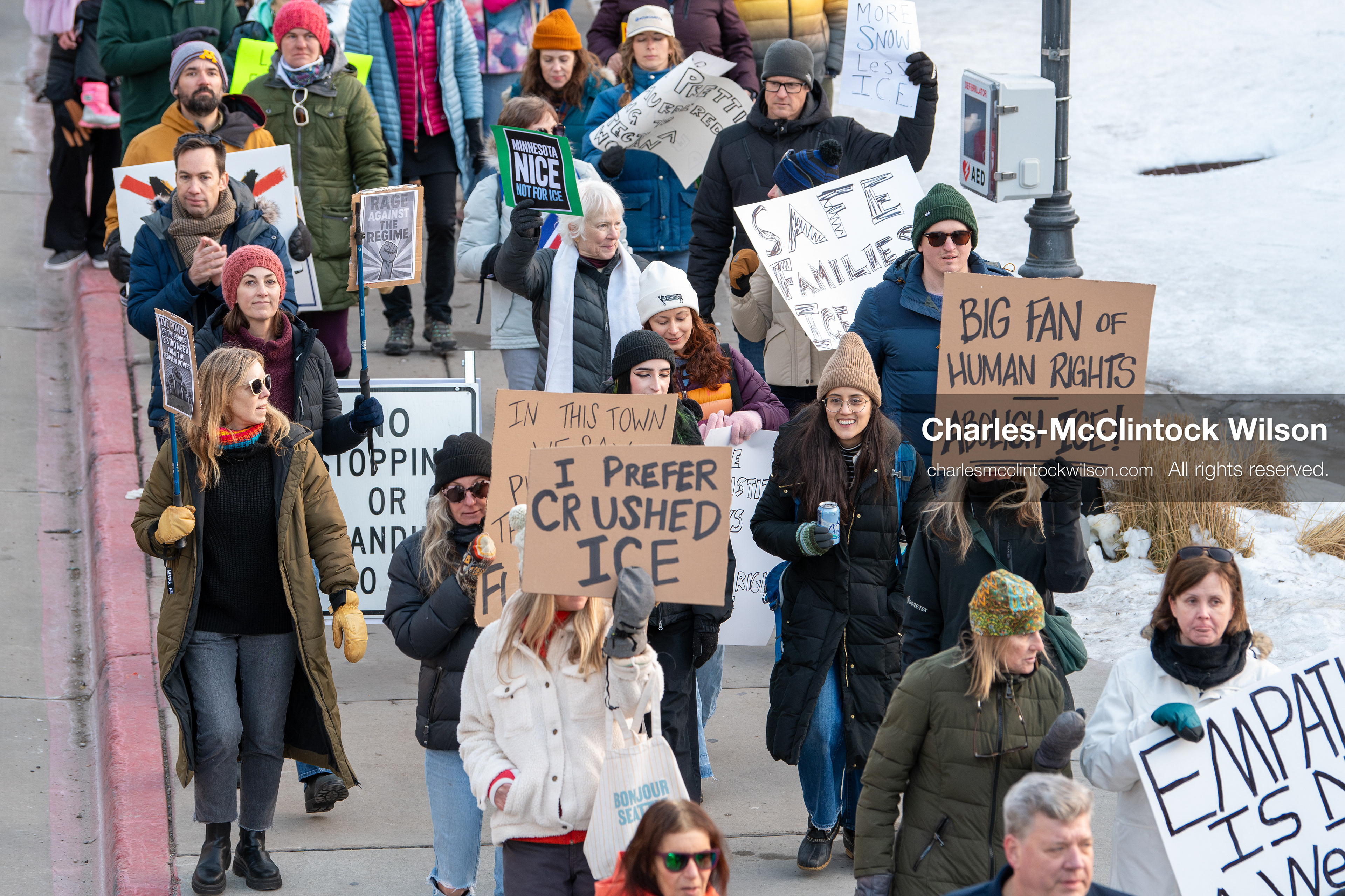 January 26, 2026, Park City, Utah, USA: Demonstrators march through Main Street holding signs during a protest opposing U.S. Immigration and Customs Enforcement (I.C.E.) ICE agents at the Sundance Film Festival in Park City, Utah, on Monday, Jan. 26, 2026. The event was held in response to the fatal shooting of Alex Pretti by a U.S. Border Patrol officer in Minneapolis. (Credit Image: © Charles McClintock Wilson/ZUMA Press Wire)
