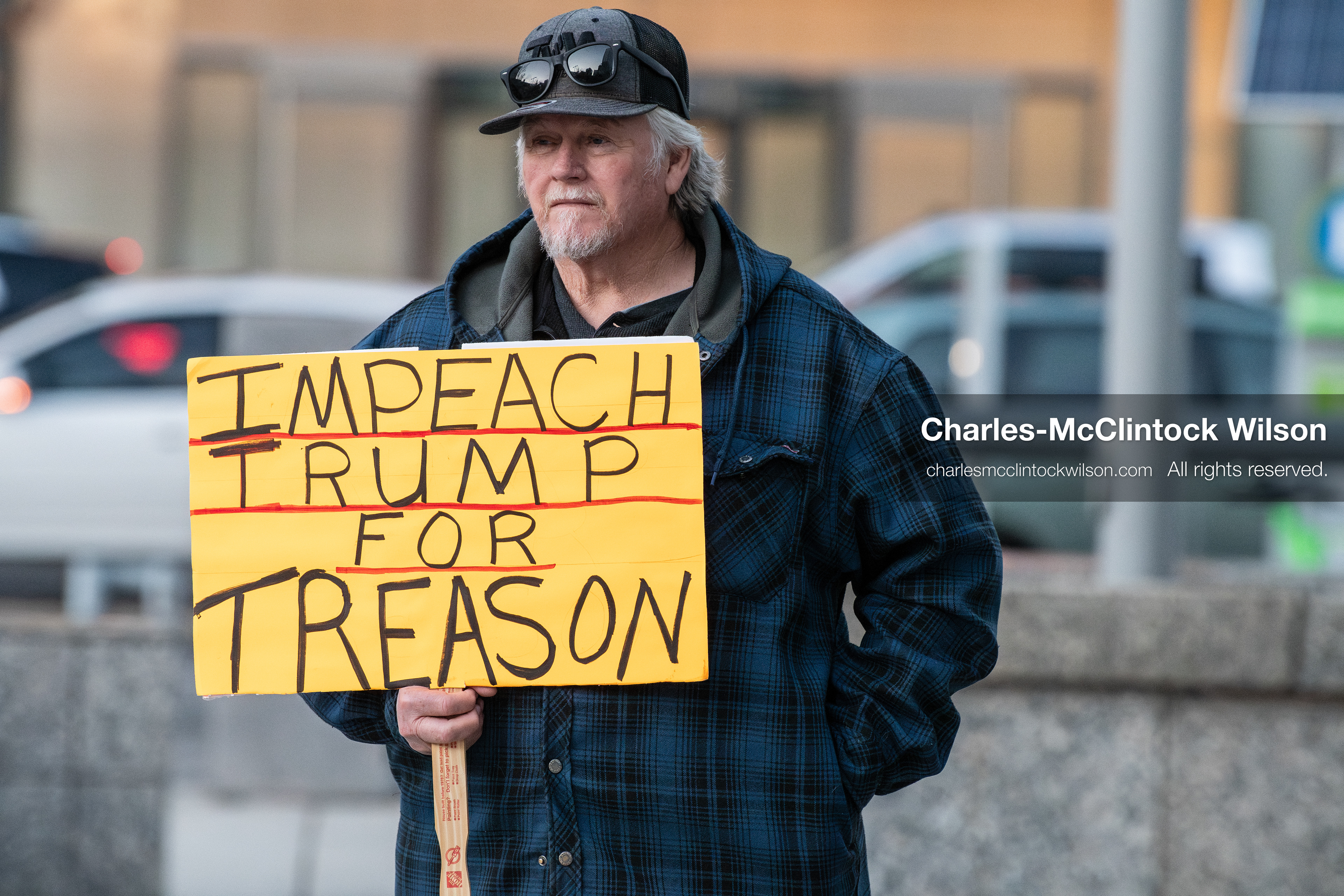 January 5, 2026, Salt Lake City, Utah, USA: A demonstrator holds a sign during a protest outside the Wallace Federal Building in Salt Lake City, Utah. The rally, organized by Salt Lake Indivisible, called for congressional limits on presidential war powers following recent US military actions in Venezuela involving the government of Nicolas Maduro. (Credit Image: (c) Charles‑McClintock Wilson/ZUMA Press Wire)