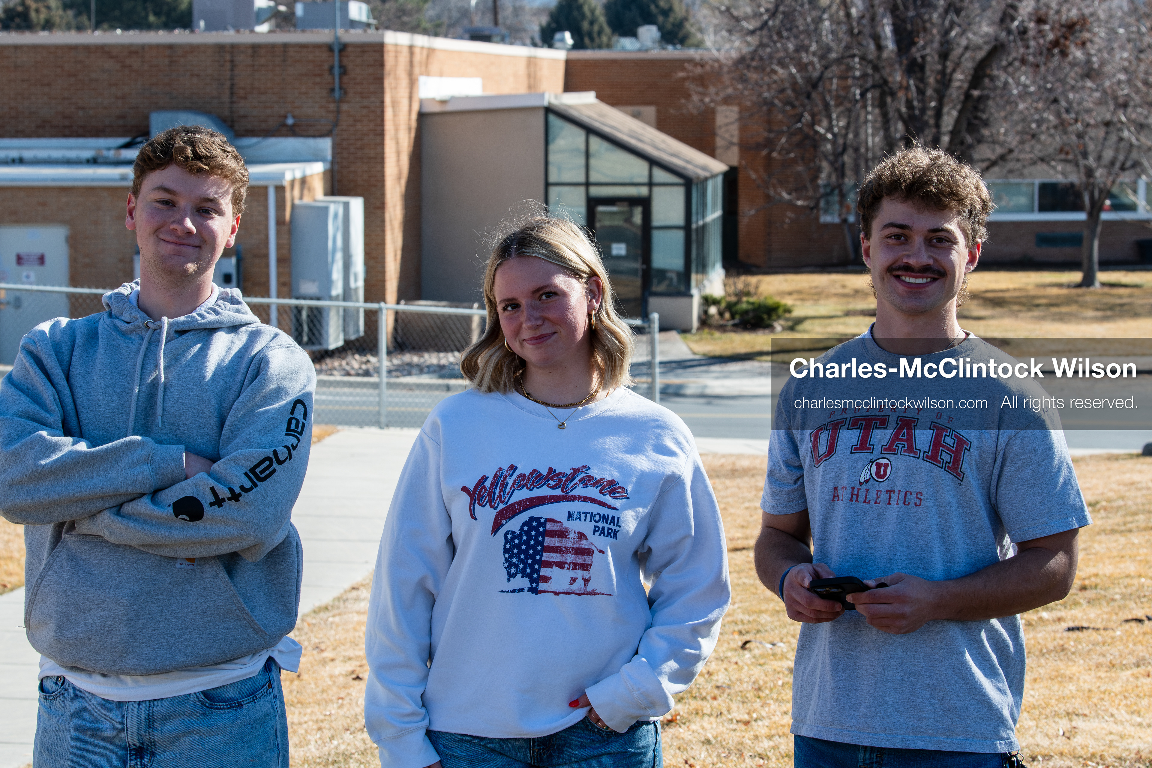 February 5, 2026, Provo, Utah, USA: Members of the Turning Point USA chapter at Brigham Young University pose for a photo in Provo as a protest takes place nearby opposing the presence of US Customs and Border Protection recruiters at a career fair held at the university. (Credit Image: © Charles McClintock Wilson/ZUMA Press Wire)