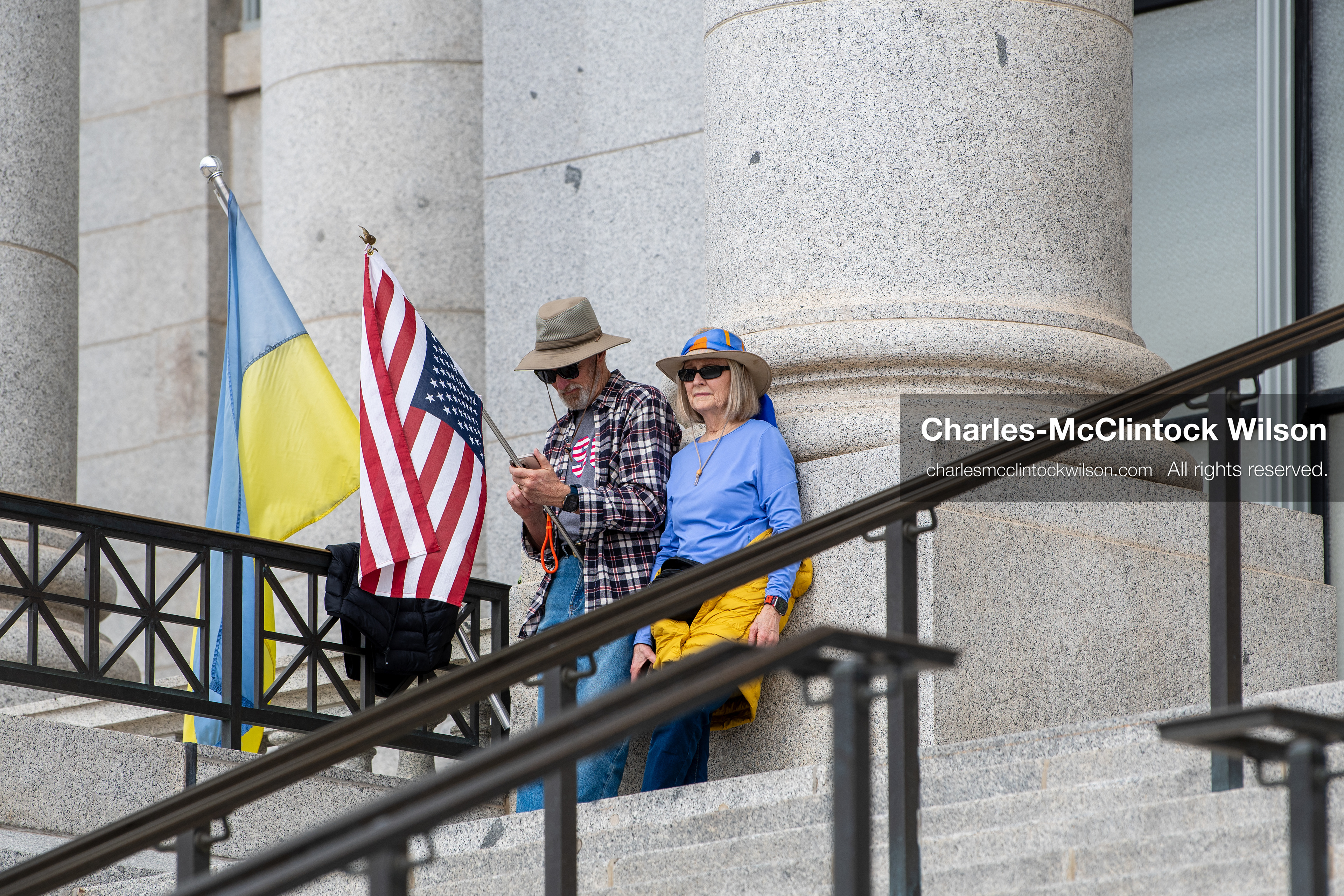 February 28, 2026, Salt Lake City, Utah, USA: Demonstrators gather on the steps near the Utah State Capitol during the Stand With Ukraine rally, holding American and Ukrainian flags along with a sign reading Peace With Honor Equals Victory vs Tyranny Support Ukraine. The gathering marked the four year anniversary of the full scale Russian invasion of Ukraine and brought community members together in support of Ukrainians and local humanitarian efforts. (Credit Image: © Charles McClintock Wilson/ZUMA Press Wire)