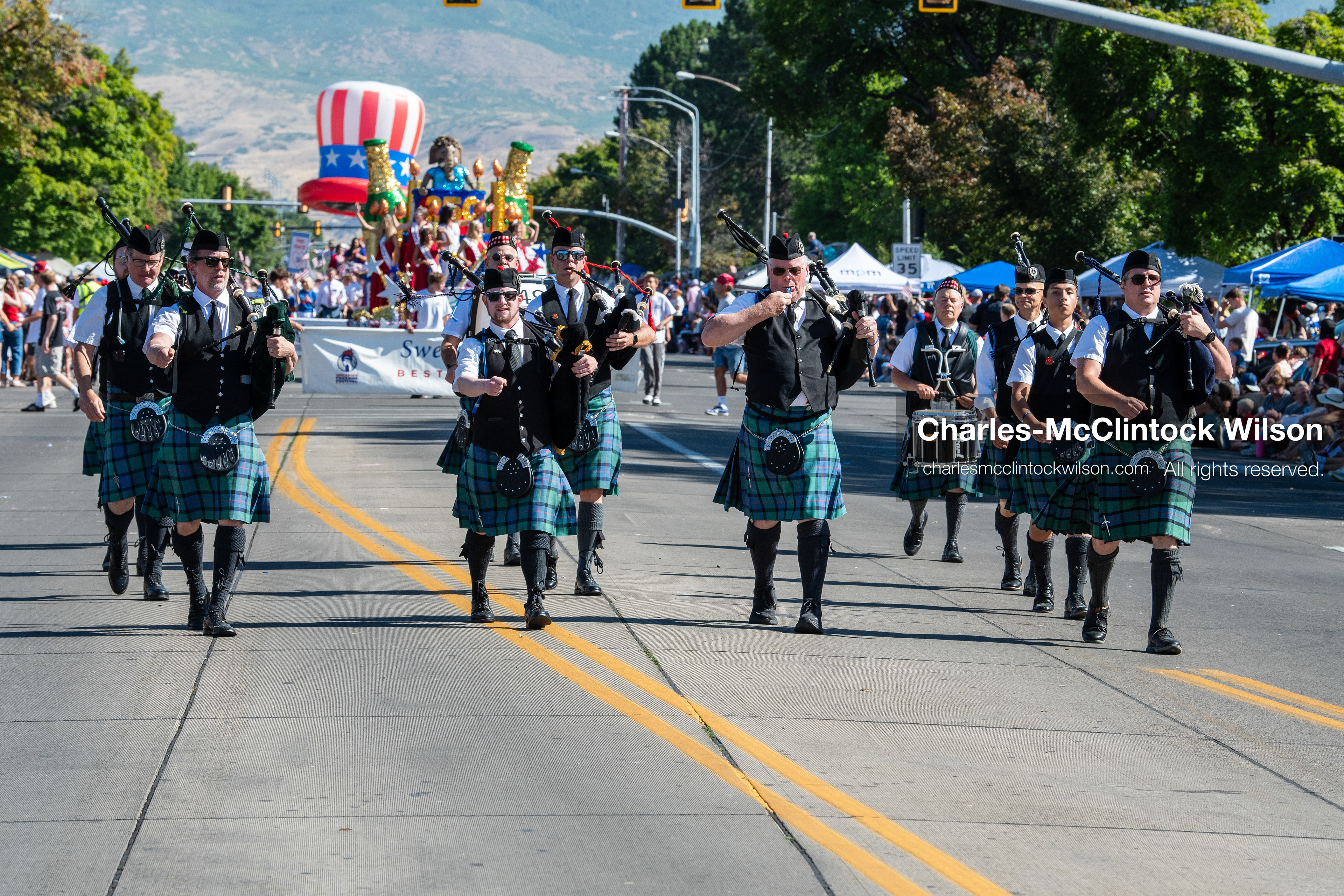 July 4, 2026, Provo, Utah, USA: Members of a pipe and drum band dressed in traditional Scottish kilts march down the street while playing bagpipes during America's Freedom Festival Grand Parade in Provo, Utah, Saturday, July 4, 2026. The annual Independence Day event features expanded programming to honor the 250th anniversary of United States independence. (Credit Image: © Charles-McClintock Wilson/ZUMA Press Wire)`