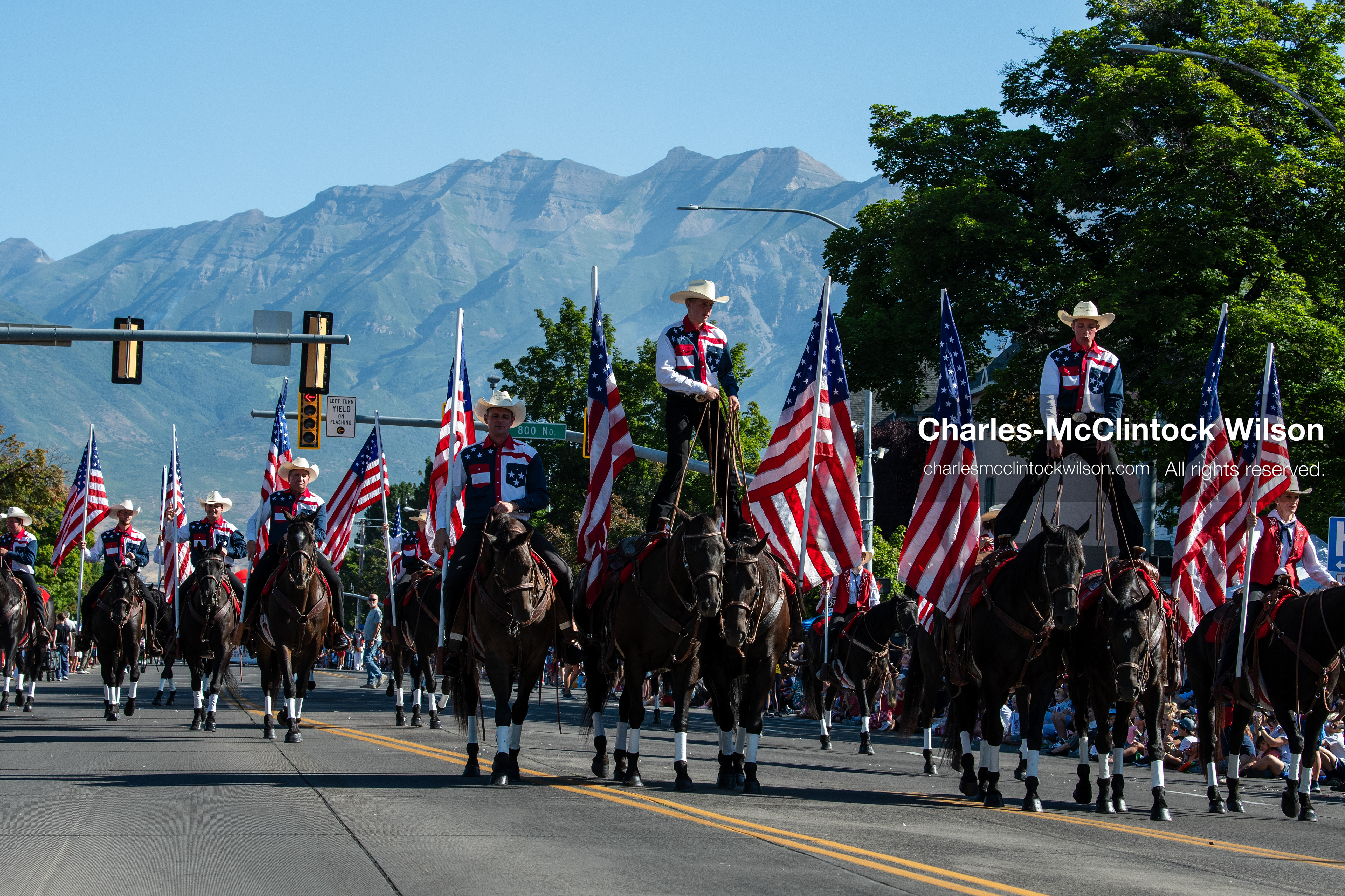  July 4, 2026, Provo, Utah, USA: Equestrian performers balance upright on horseback while carrying American flags down the street during America's Freedom Festival Grand Parade in Provo, Utah, Saturday, July 4, 2026. The annual Independence Day event features expanded programming to honor the 250th anniversary of United States independence. (Credit Image: © Charles-McClintock Wilson/ZUMA Press Wire)