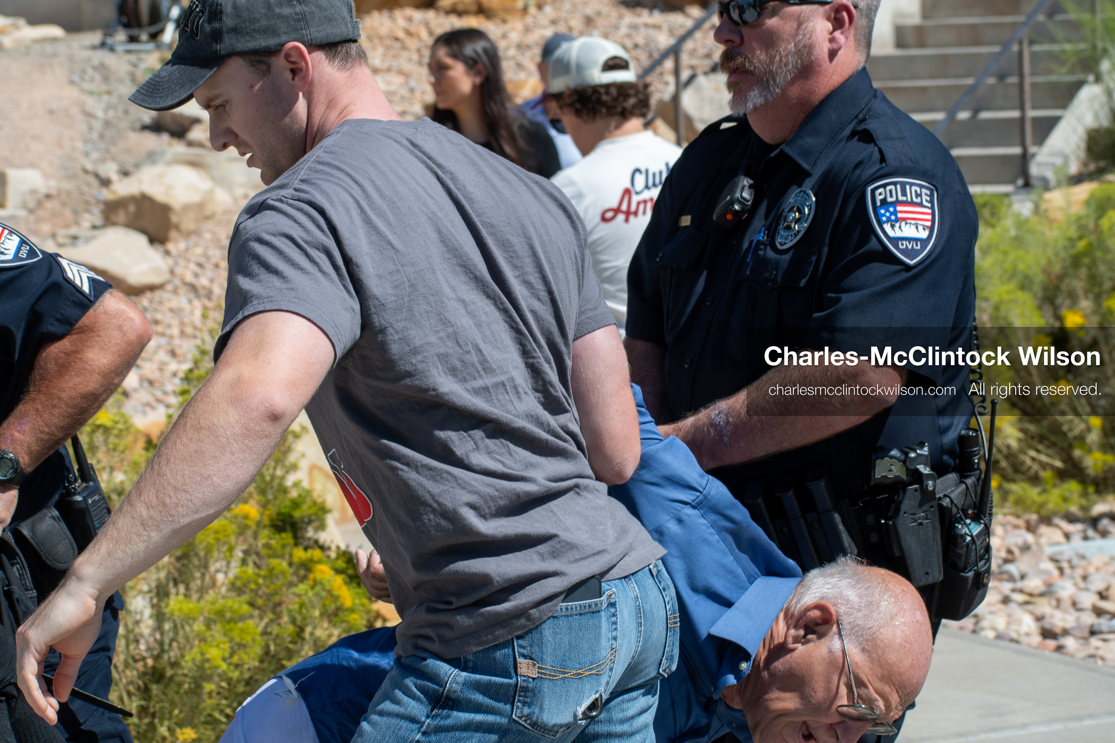 September 10, 2025, Orem, Utah, USA: George Zinn is taken into custody by campus security following the fatal shooting of Charlie Kirk during a public event at Utah Valley University. At the time of the arrest, Zinn was identified as the alleged shooter. He was later released and subsequently arrested on unrelated charges. Law enforcement confirmed that the actual suspect remained at large during this initial response. (Credit Image: © Charles-McClintock Wilson/ZUMA Press Wire)