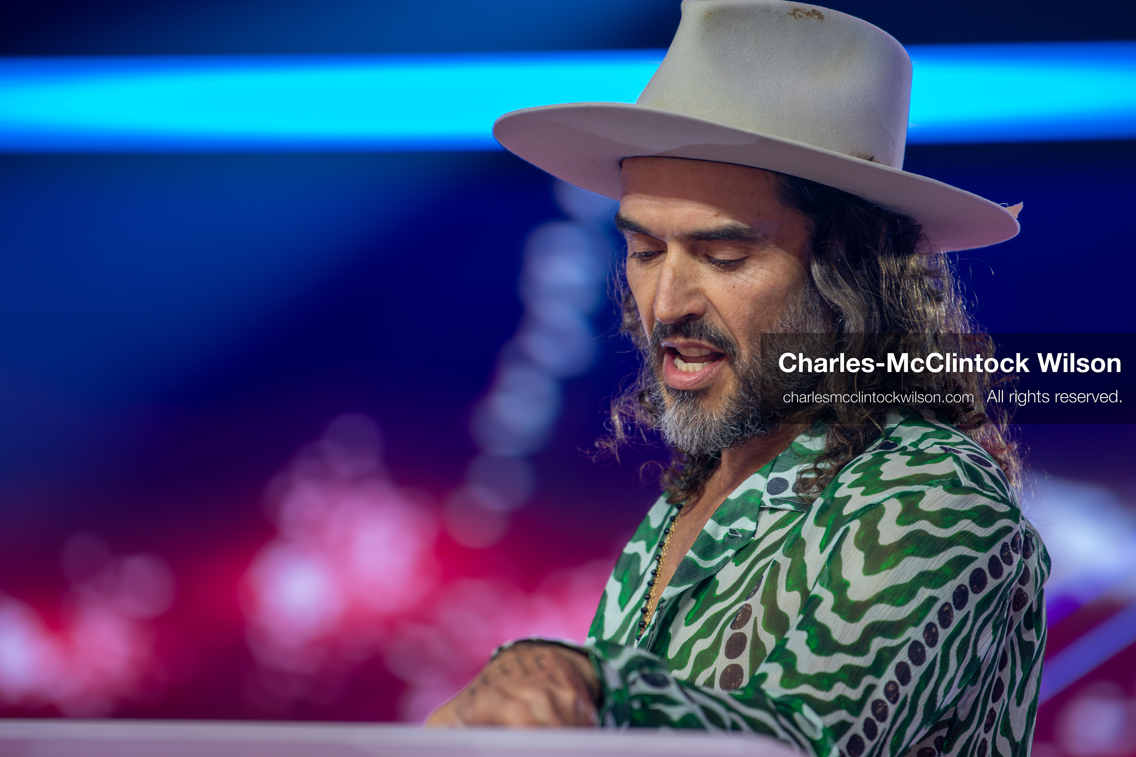 December 18, 2025, Phoenix, Arizona, USA: Russell Brand speaks during Day One of Turning Point USA’s AmericaFest 2025 at the Phoenix Convention Center in Phoenix, Arizona.   (Credit Image: © Charles‑McClintock Wilson/ZUMA Press Wire)