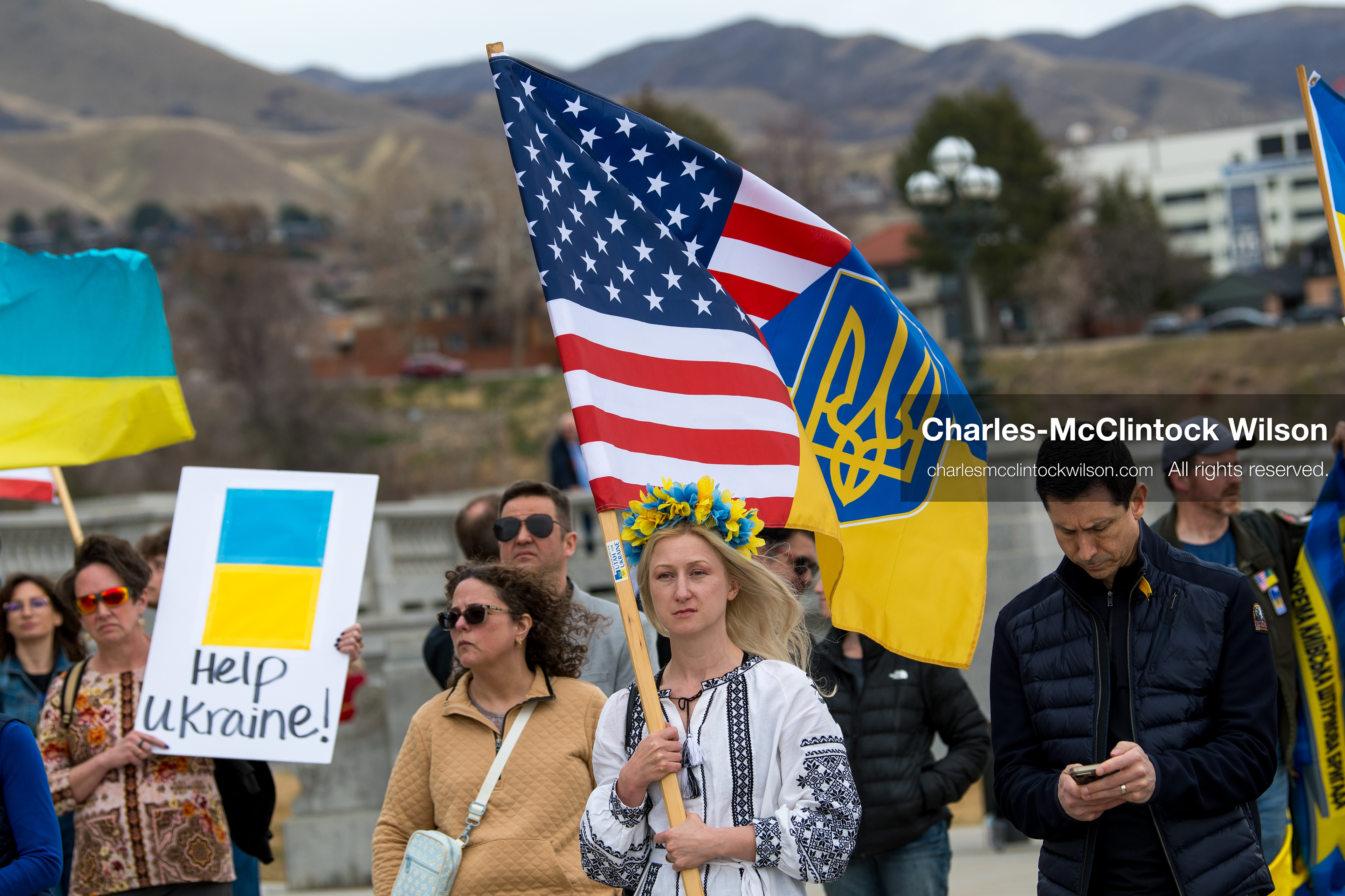 February 28, 2026, Salt Lake City, Utah, USA: A woman wearing a traditional Ukrainian embroidered blouse and a blue and yellow flower wreath holds a Ukrainian flag during the Stand With Ukraine rally near the Utah State Capitol. The gathering marked the four year anniversary of the full scale Russian invasion of Ukraine and brought community members together in support of Ukrainians and local humanitarian efforts. (Credit Image: © Charles McClintock Wilson/ZUMA Press Wire)