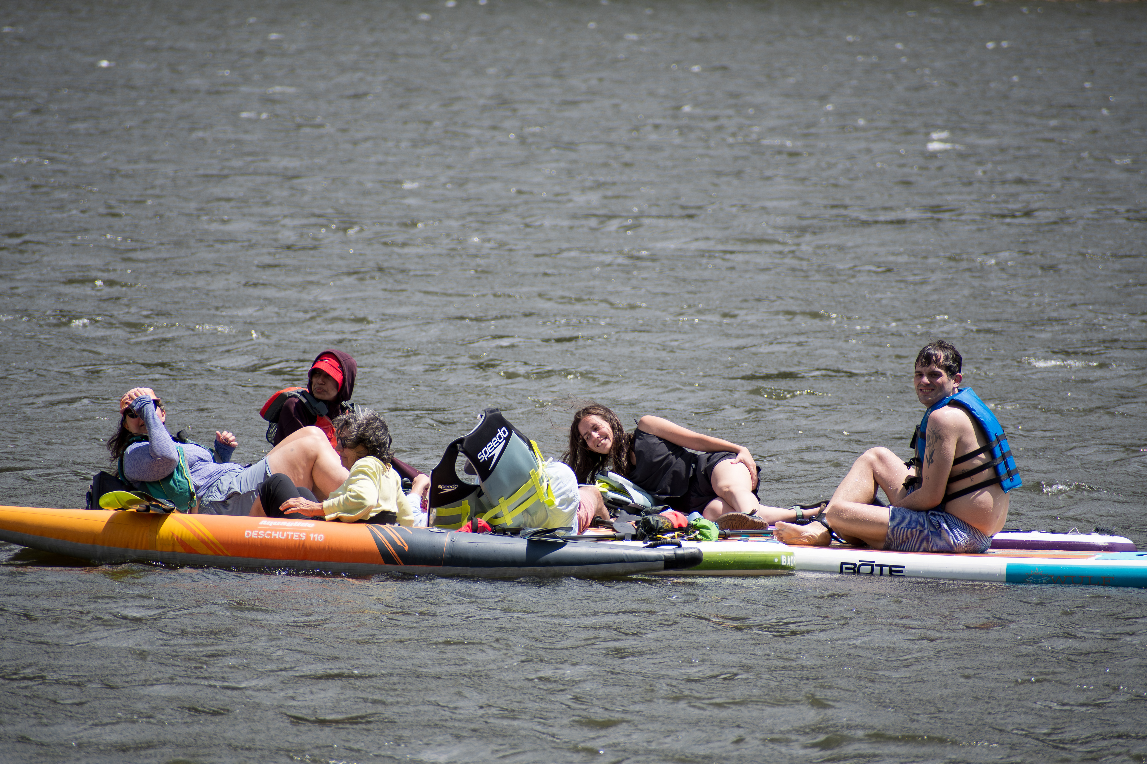 Summit County, Utah – July 20, 2025: People enjoy outdoor recreation on kayaks and paddleboards at Smith and Morehouse Reservoir.