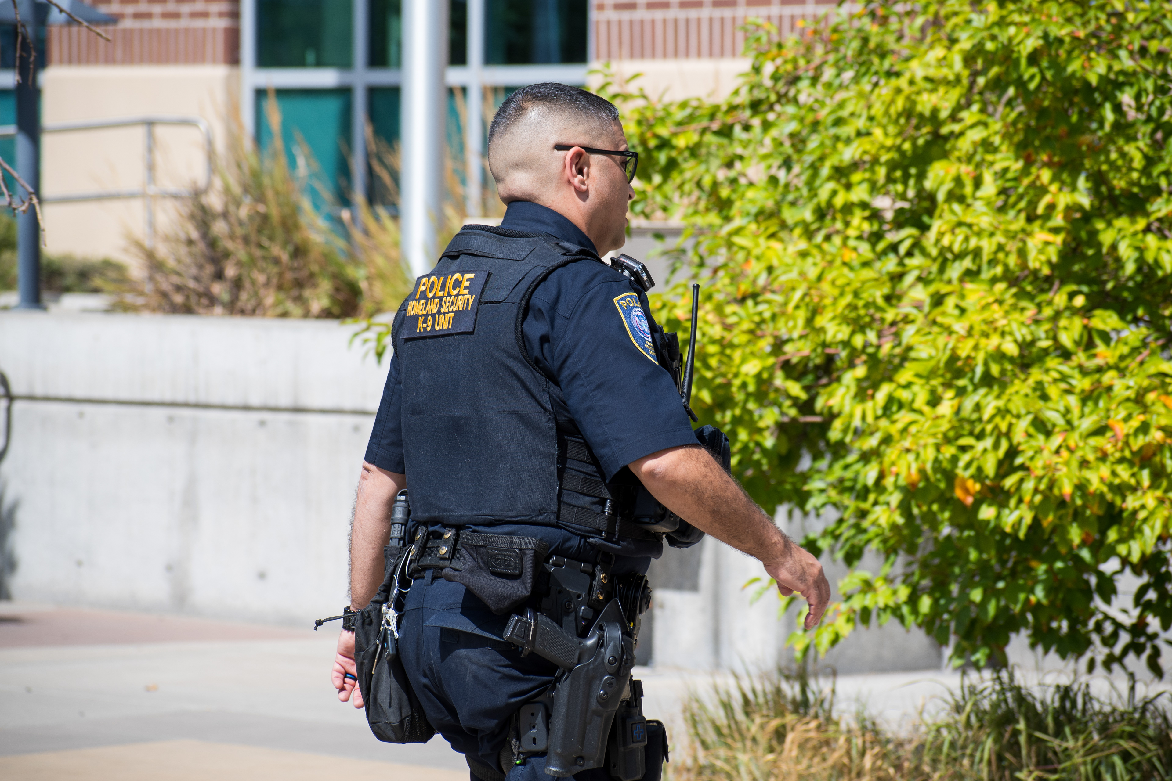 September 15, 2025 – Provo, Utah, United States: A Homeland Security police officer walks near the Utah Valley Convention Center during a Department of Homeland Security career expo focused on recruiting law enforcement and security personnel. Photograph by Charles‑McClintock Wilson / ZUMA Press Wire