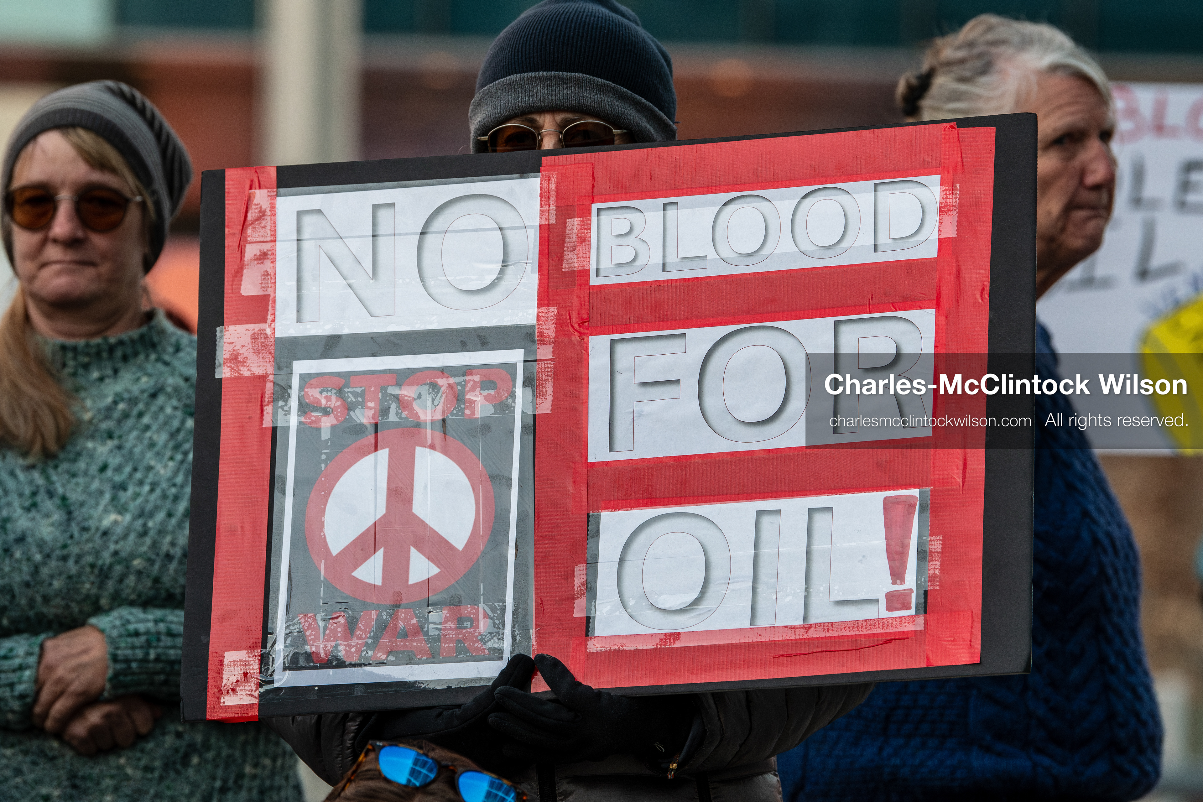 January 5, 2026, Salt Lake City, Utah, USA: A demonstrator holds a sign during a protest outside the Wallace Federal Building in Salt Lake City, Utah. The rally, organized by Salt Lake Indivisible, called for congressional limits on presidential war powers following recent US military actions in Venezuela involving the government of Nicolas Maduro. (Credit Image: (c) Charles‑McClintock Wilson/ZUMA Press Wire)
