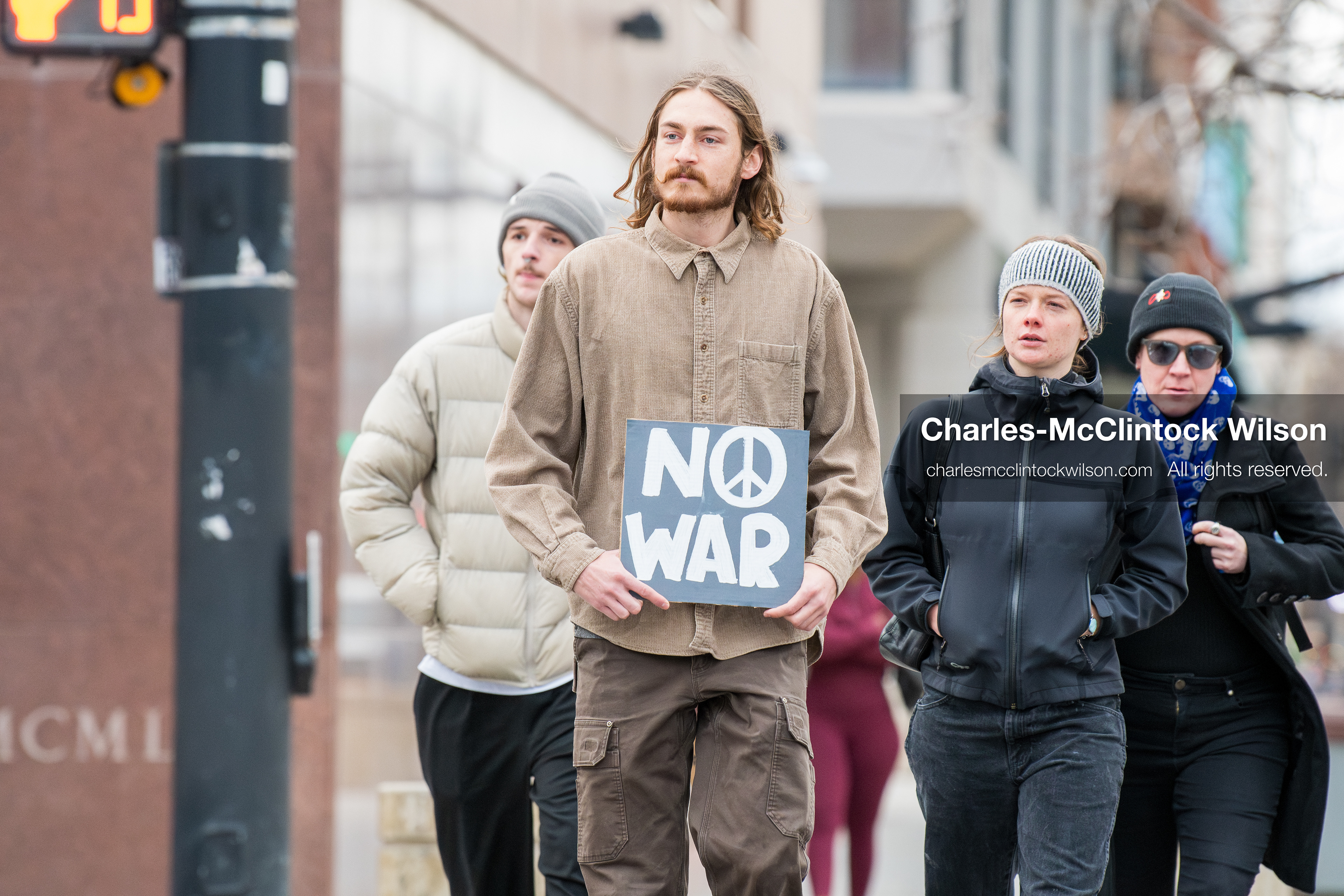 January 3, 2026, Salt Lake City, Utah, USA: A protester holds a sign during a demonstration against US action in Venezuela outside the Wallace Federal Building in Salt Lake City, Utah. The protest was part of a nationwide mobilization responding to recent military developments. (Credit Image: (c) Charles‑McClintock Wilson/ZUMA Press Wire)