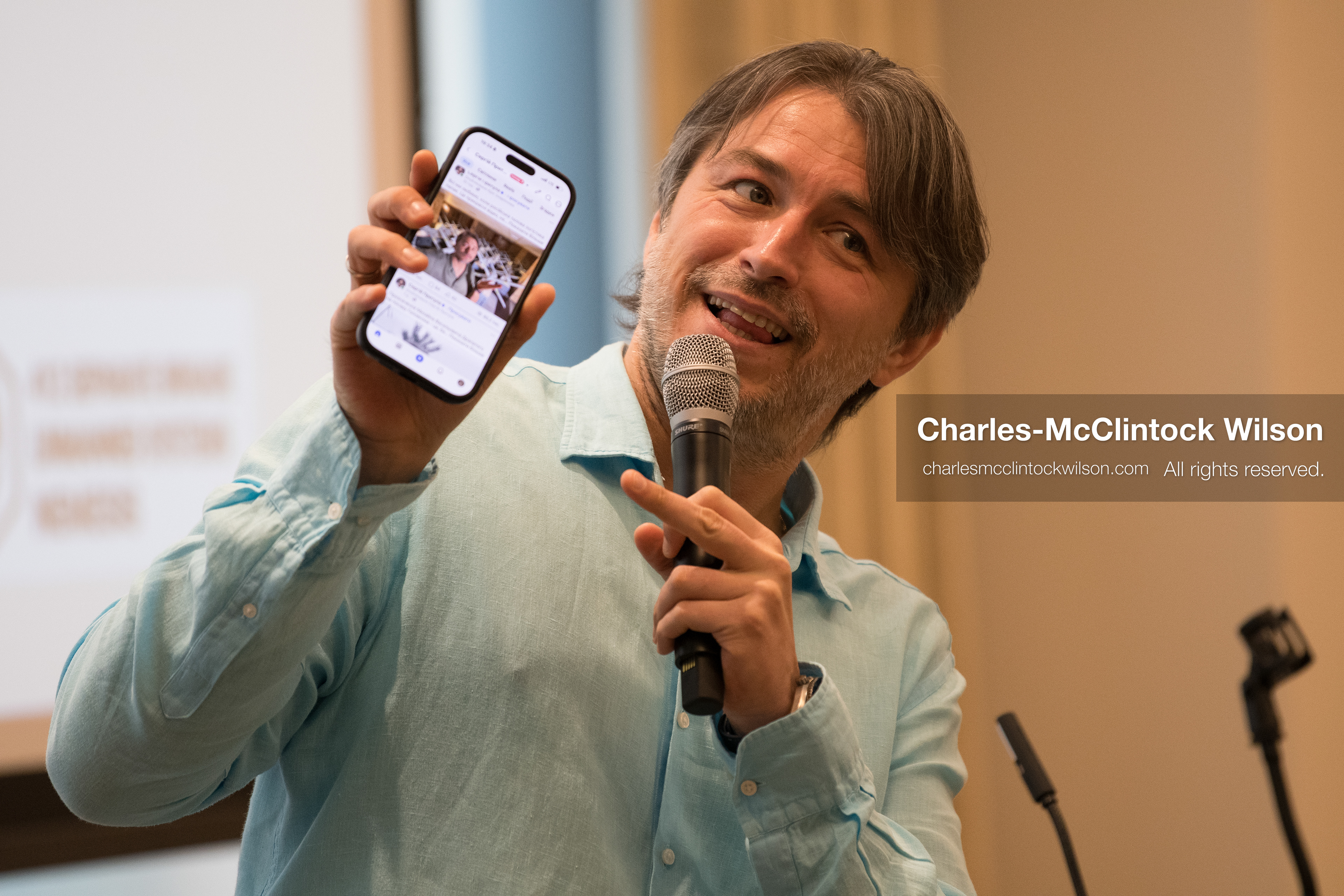uly 23, 2026, Salt Lake City, Utah, USA: Ukrainian activist SERHIY PRYTULA holds up his smartphone to display a photograph to the audience during a community meeting at the Utah State Capitol building in Salt Lake City, Utah, on Thursday, July 23, 2026. The event, titled ''Ukraine in the Fifth Year of the Full-Scale War: An Honest Conversation,'' was hosted by the Prytula Foundation USA to discuss civil defense and ongoing humanitarian aid initiatives. (Credit Image: © Charles-McClintock Wilson/ZUMA Press Wire)
