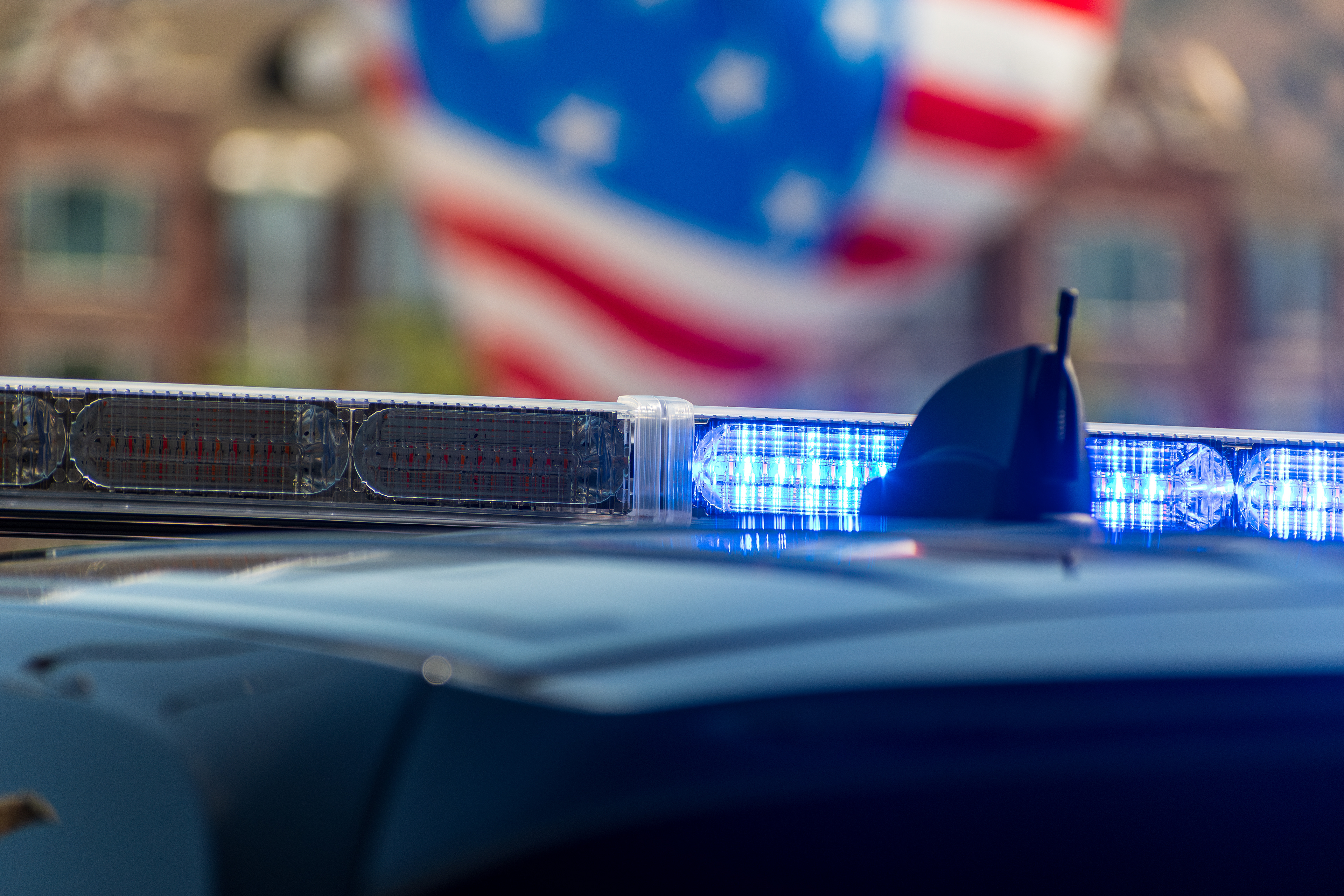Provo, Utah – July 4, 2025: Flashing lights of a Provo Police Department cruiser are seen during the Freedom Festival Grand Parade in downtown Provo.