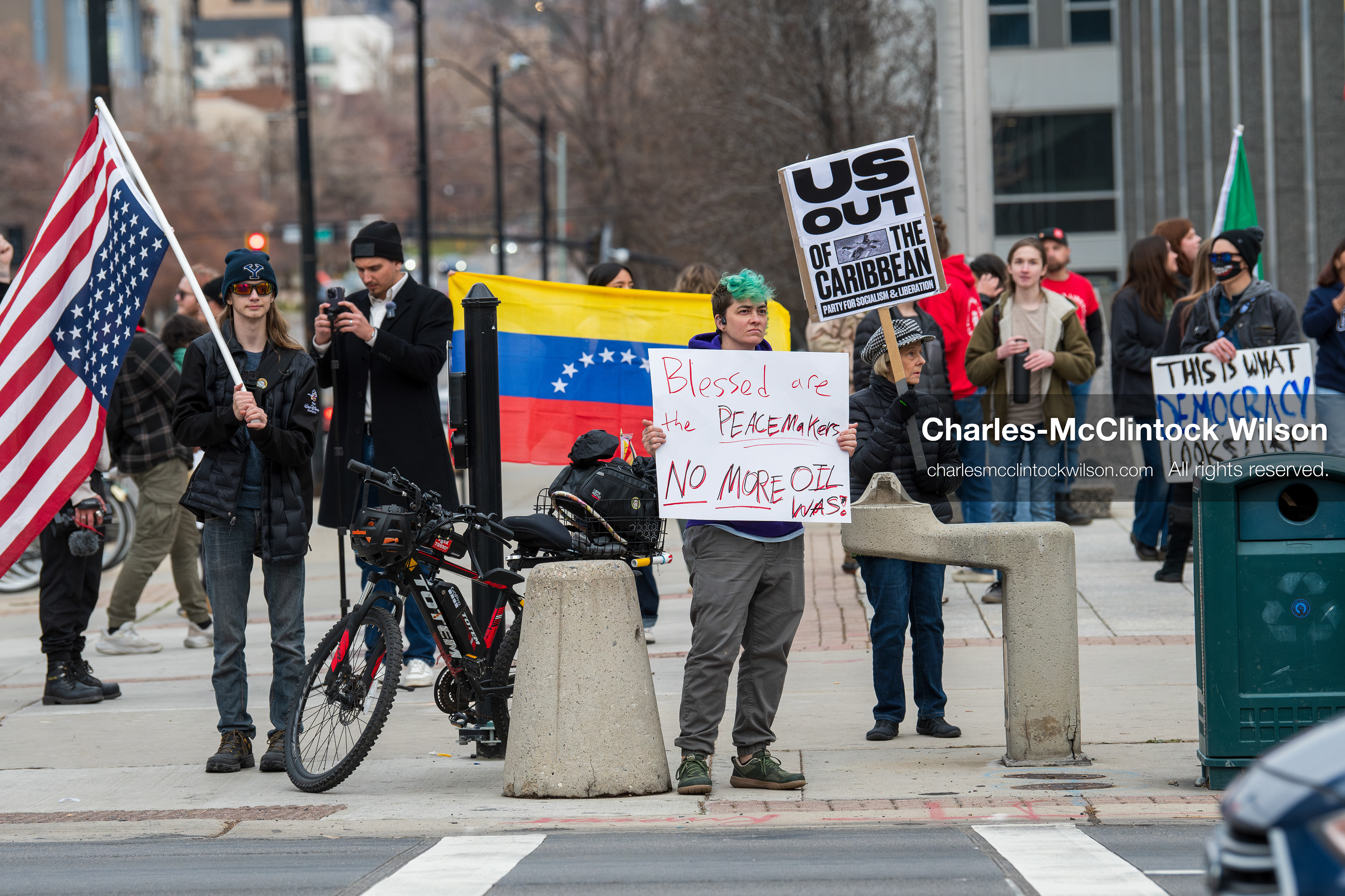 January 3, 2026, Salt Lake City, Utah, USA: Protesters hold signs during an emergency demonstration against US action in Venezuela outside the Wallace Federal Building in Salt Lake City, Utah. The event was part of a nationwide mobilization responding to recent military developments. (Credit Image: (c) Charles‑McClintock Wilson/ZUMA Press Wire)