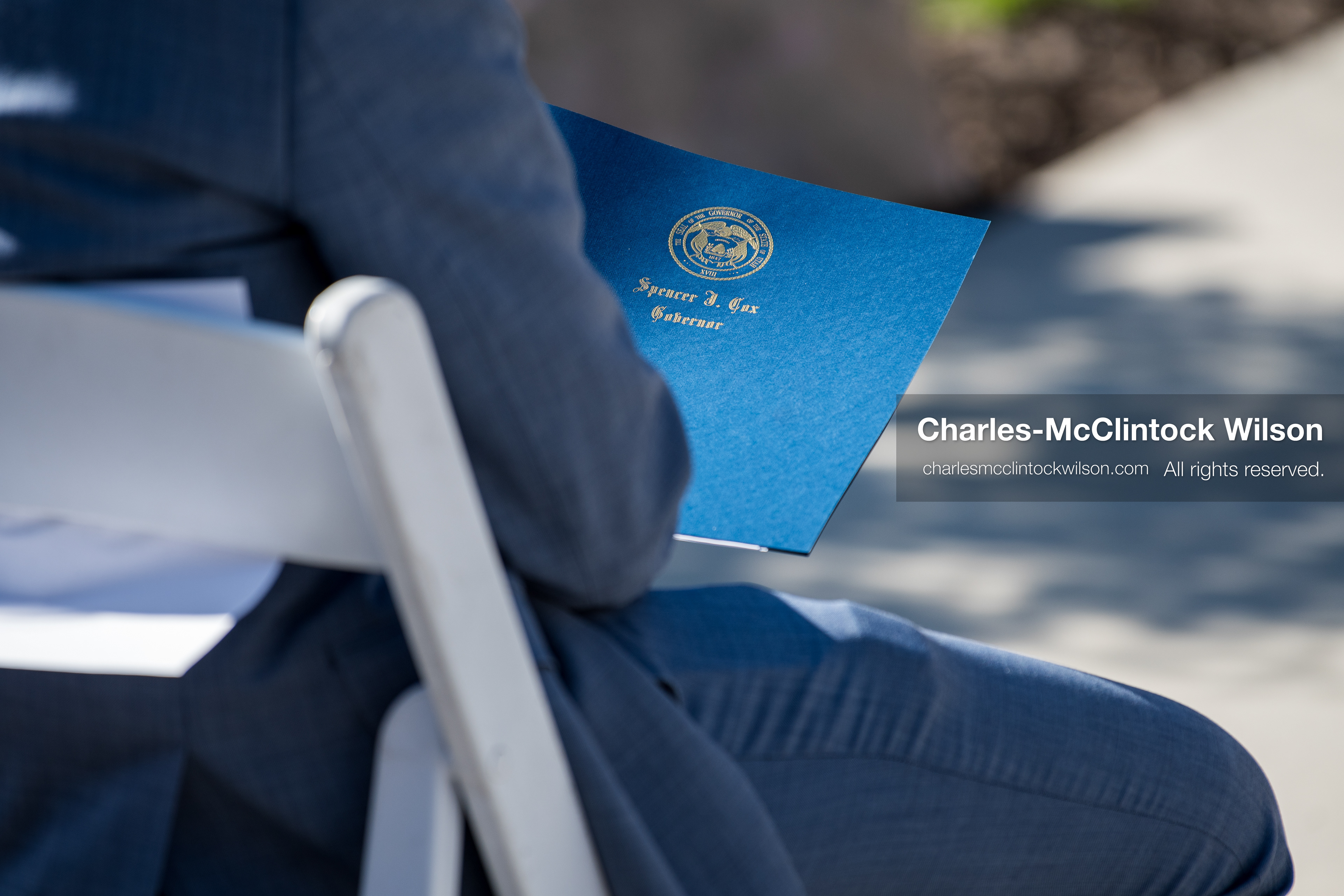 May 28, 2026, Lehi, Utah, USA: Utah Governor SPENCER COX holds a blue folder embossed with the Utah state seal during the opening of Innovation Park at Holbrook Farms and the Lehi Rippy Literacy Center on May 28 2026 in Lehi Utah. (Credit Image: © Charles-McClintock Wilson/ZUMA Press Wire)