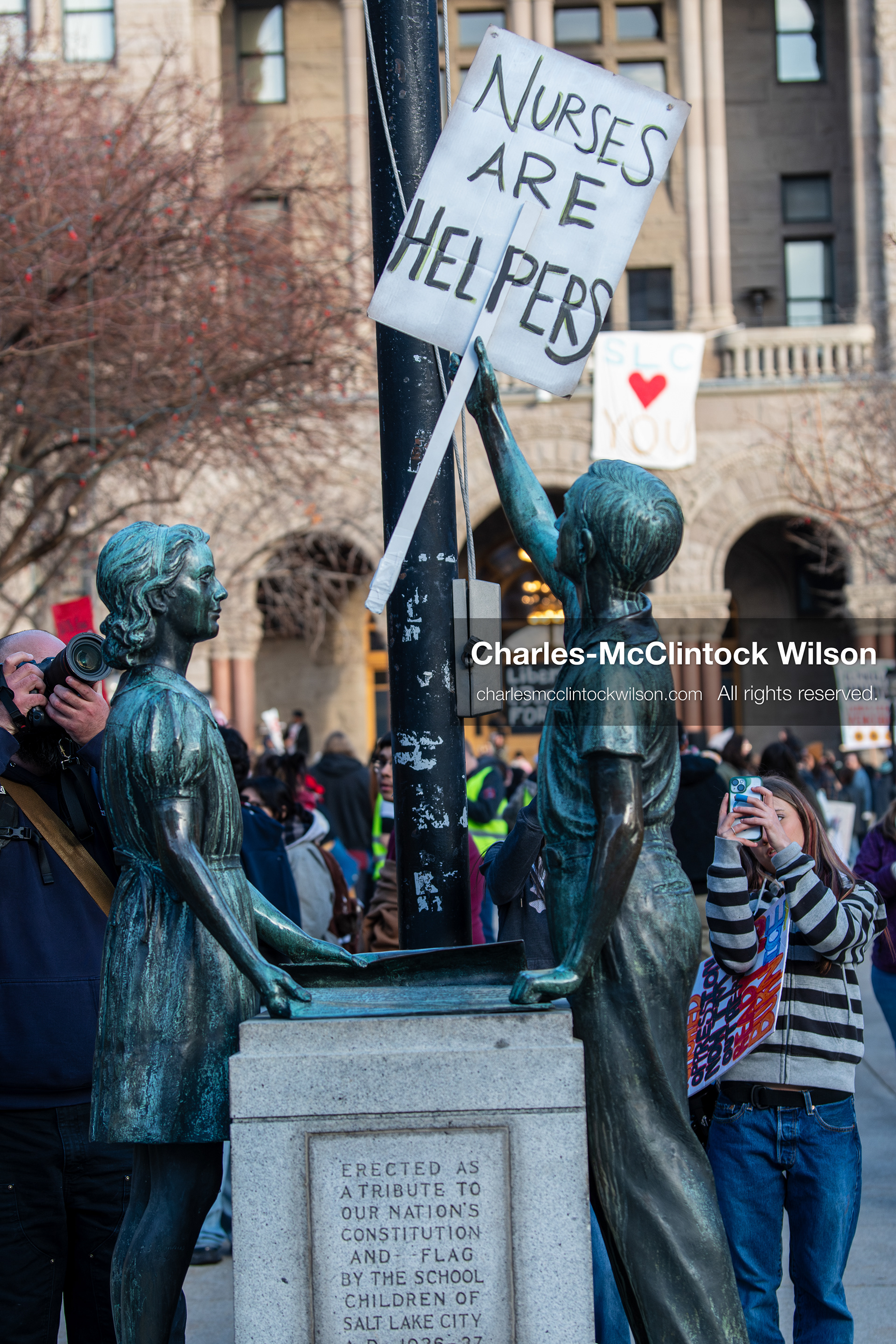 January 30, 2026, Salt Lake City, Utah, USA: A protest sign is displayed on a statue at Washington Square Park during an anti‑ICE protest in Salt Lake City, part of a nationwide response to immigration enforcement policies. (Credit Image: © Charles‑McClintock Wilson/ZUMA Press Wire)