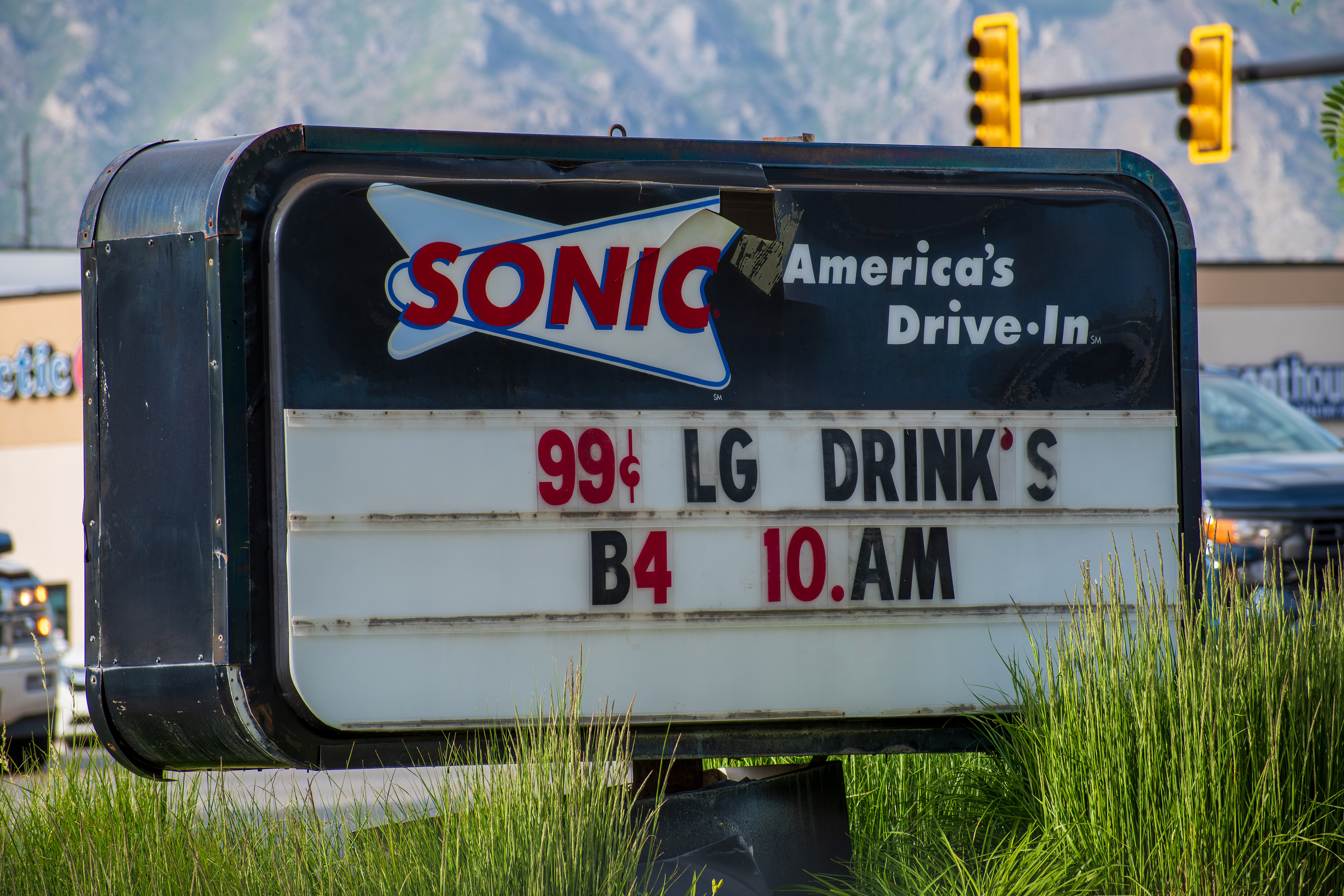 Spanish Fork, UT, USA – May 28, 2025: Signage outside a Sonic Drive-In restaurant in Spanish Fork, Utah, highlights the classic American fast-food chain known for its drive-in service and iconic menu.