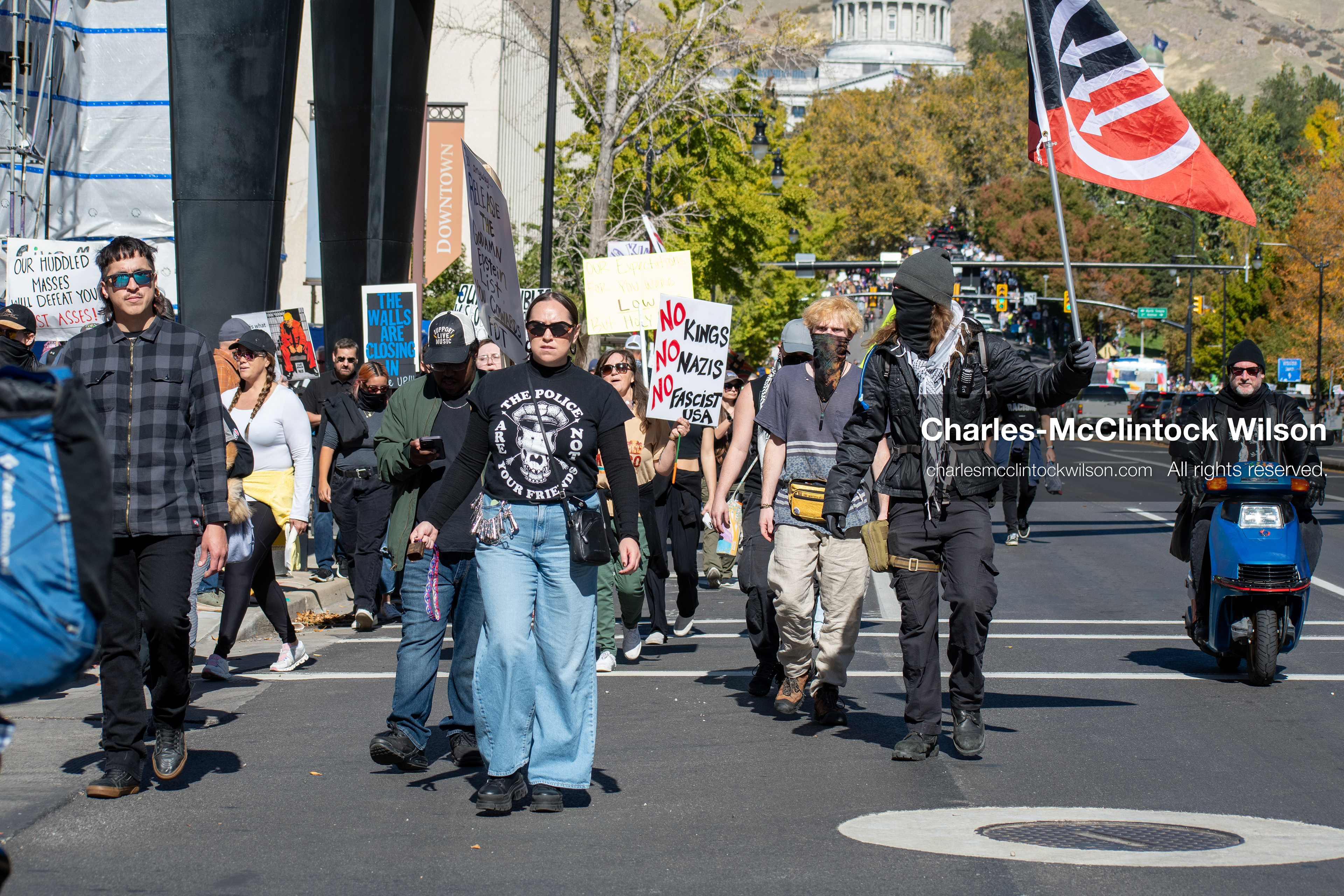 October 18, 2025, Salt Lake City, Utah, USA: Demonstrators march along South State Street during a "No Kings" protest in Salt Lake City, Utah. The protest was part of a nationwide mobilization.