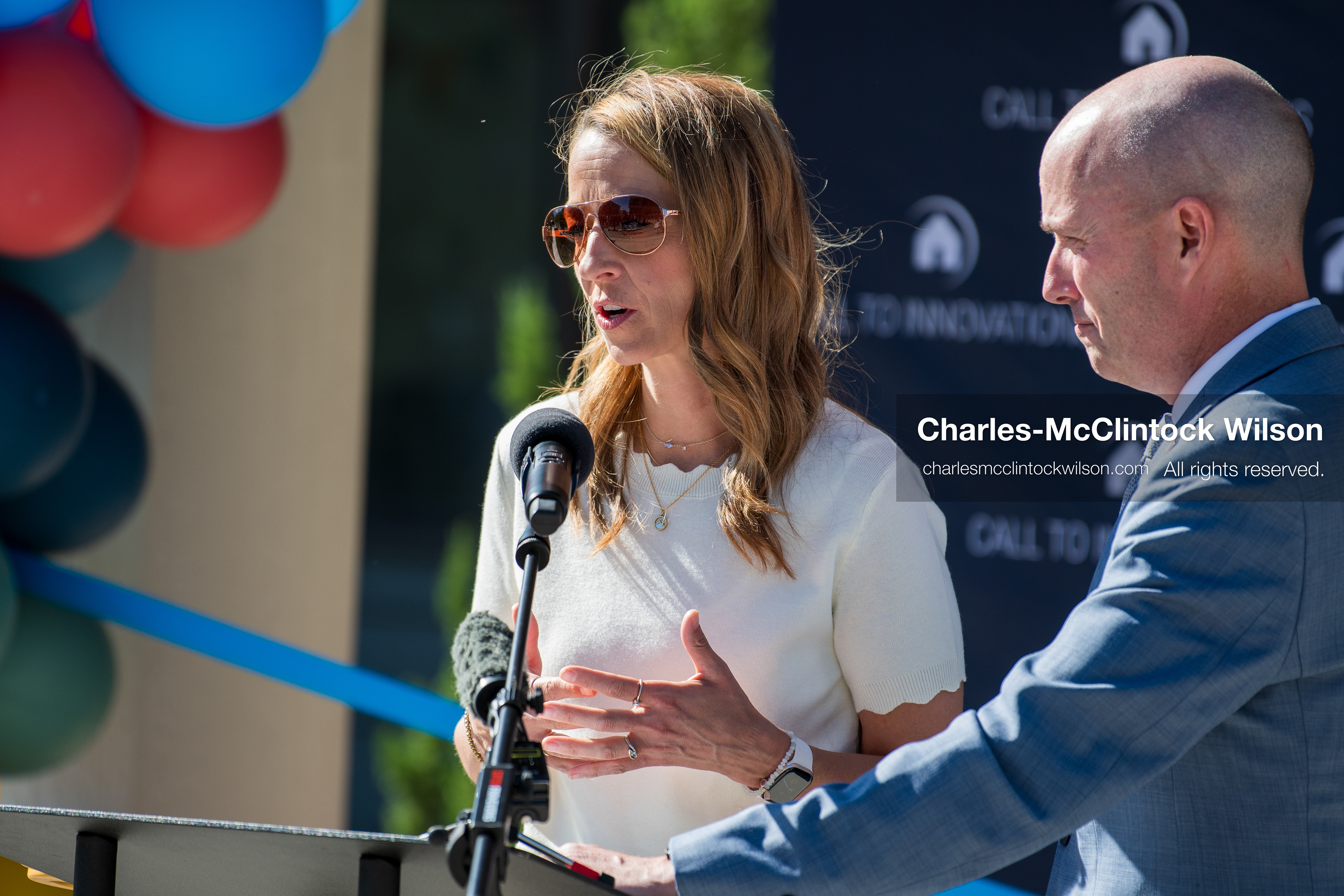 May 28, 2026, Lehi, Utah, USA: Utah First Lady ABBY COX speaks as Governor SPENCER COX looks on during the opening of Innovation Park at Holbrook Farms and the Lehi Rippy Literacy Center on May 28, 2026, in Lehi, Utah. (Credit Image: © Charles‑McClintock Wilson/ZUMA Press Wire)