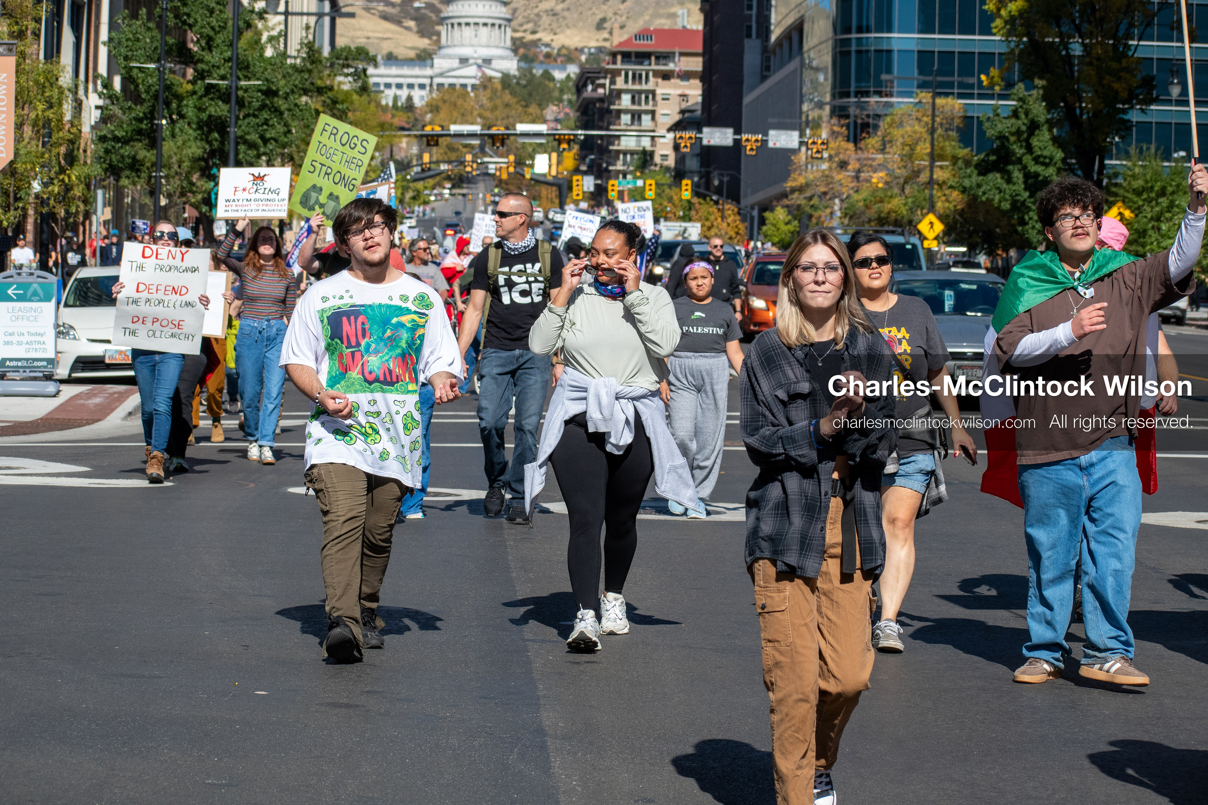 October 18, 2025, Salt Lake City, Utah, USA: Demonstrators march along South State Street during a "No Kings" protest in Salt Lake City, Utah. The protest was part of a nationwide mobilization.