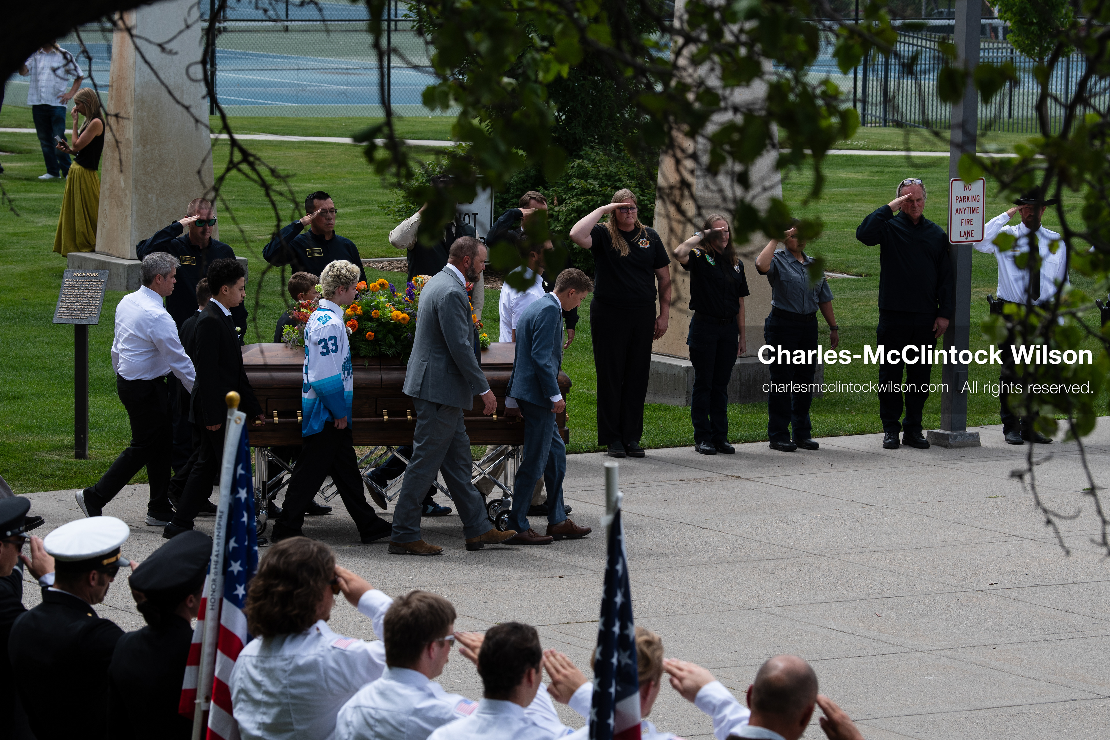 Pallbearers and family members escort the casket of a Long family member outside the UCCU Center at Utah Valley University in Orem, Utah, on Wednesday, July 29, 2026. More than 300 people came to the public memorial ceremony to honor Provo Fire Captain Spencer Long, his wife Katrina, and three of their sons, who died after a flash flood hit their campsite near the Sunglow Campground in Wayne County. (Photo by Charles-McClintock Wilson/Sipa USA)