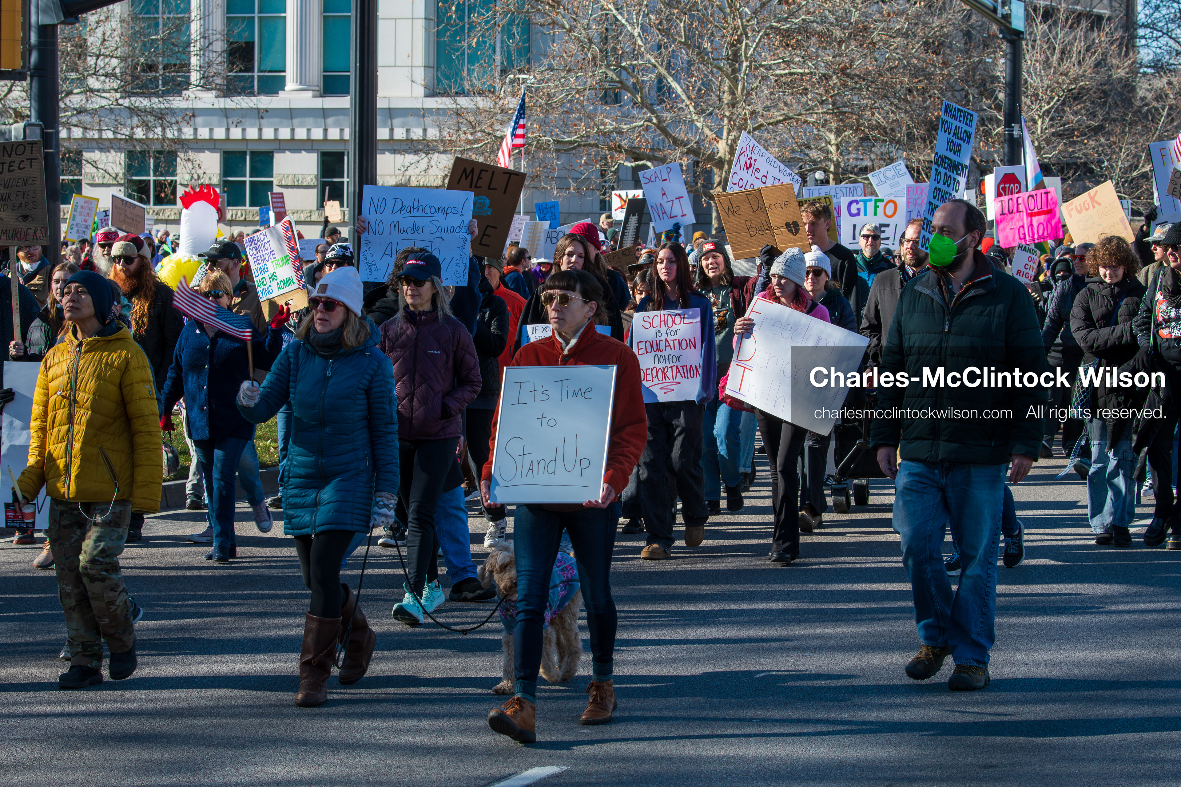 Salt Lake City, Utah, January 10, 2026: A group of demonstrators marches through downtown Salt Lake City during the ICE Out for Good protest, which began at Washington Square Park, with participants carrying signs and personal items as they walk together. (Credit Image: © Charles‑McClintock Wilson/ZUMA Press Wire)