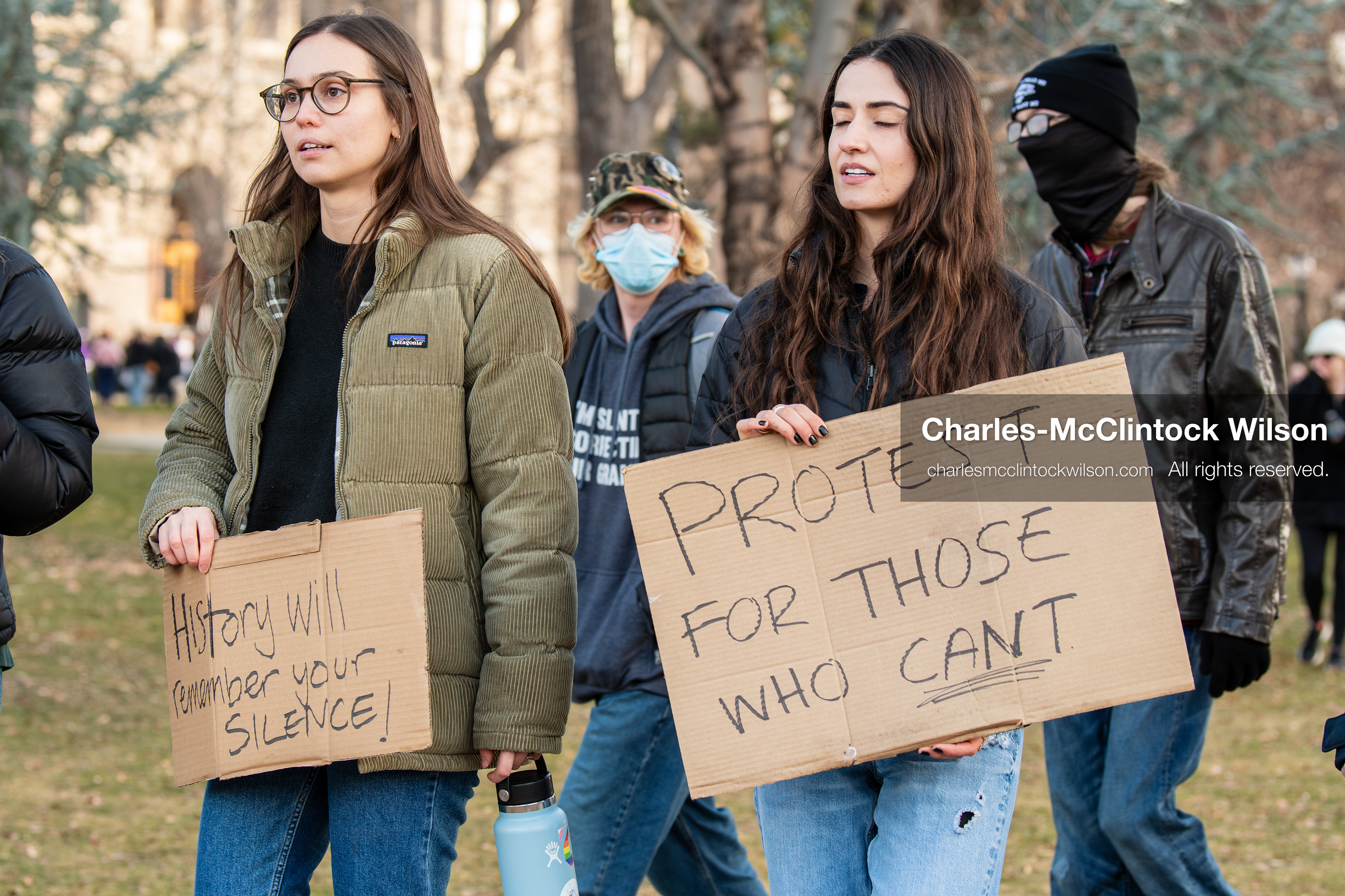 January 30, 2026, Salt Lake City, Utah, USA: Two demonstrators hold signs at Washington Square Park during an anti‑ICE protest in Salt Lake City, part of a nationwide response to immigration enforcement policies. (Credit Image: © Charles‑McClintock Wilson/ZUMA Press Wire)