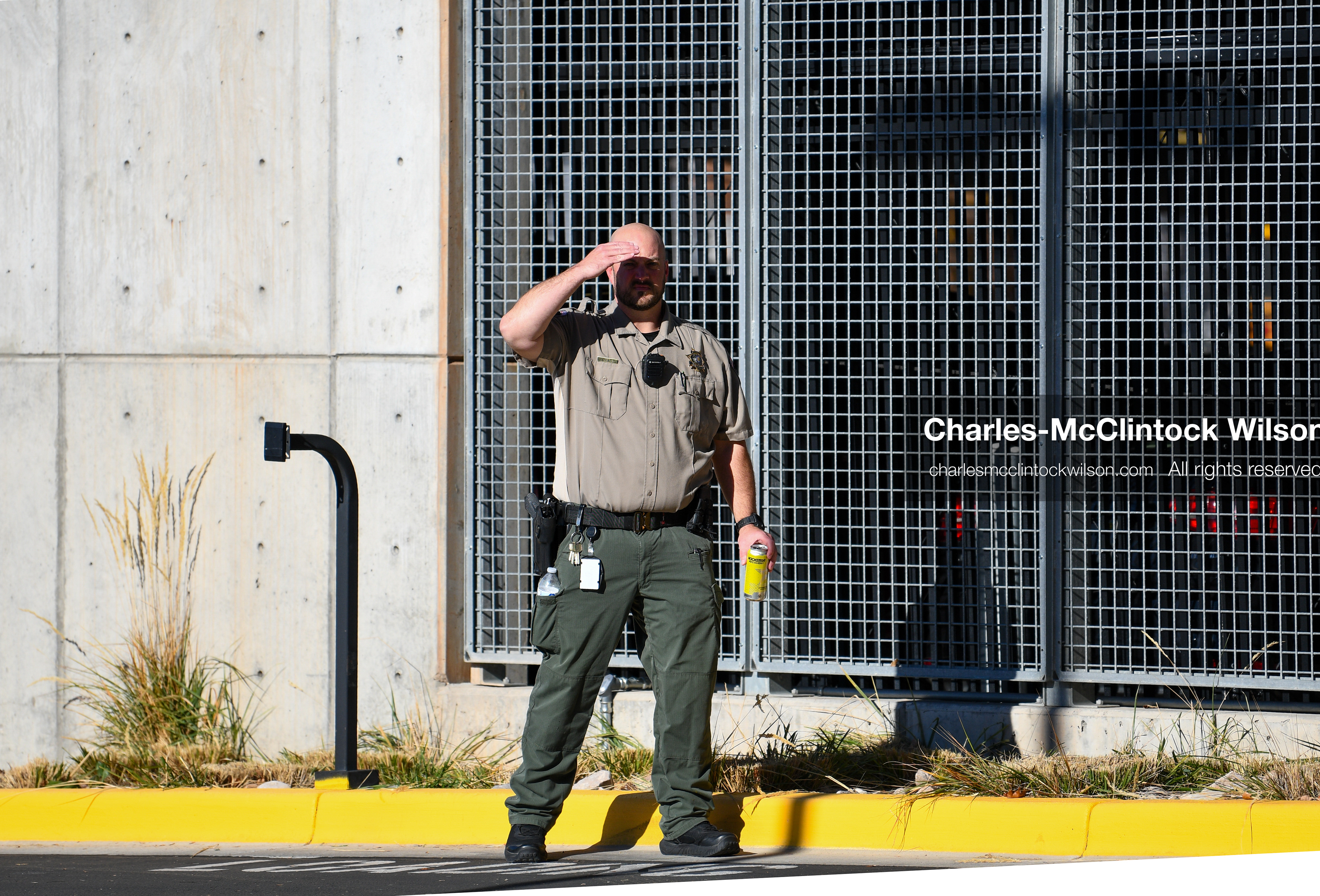 PROVO, UTAH, USA – DECEMBER 11, 2025: A Utah County Sheriff’s Office officer patrols the parking lot of the Fourth District Court in Provo during the first in‑person court appearance of Tyler Robinson in the Charlie Kirk murder case. (Credit Image: © Charles‑McClintock Wilson/ZUMA Press Wire)