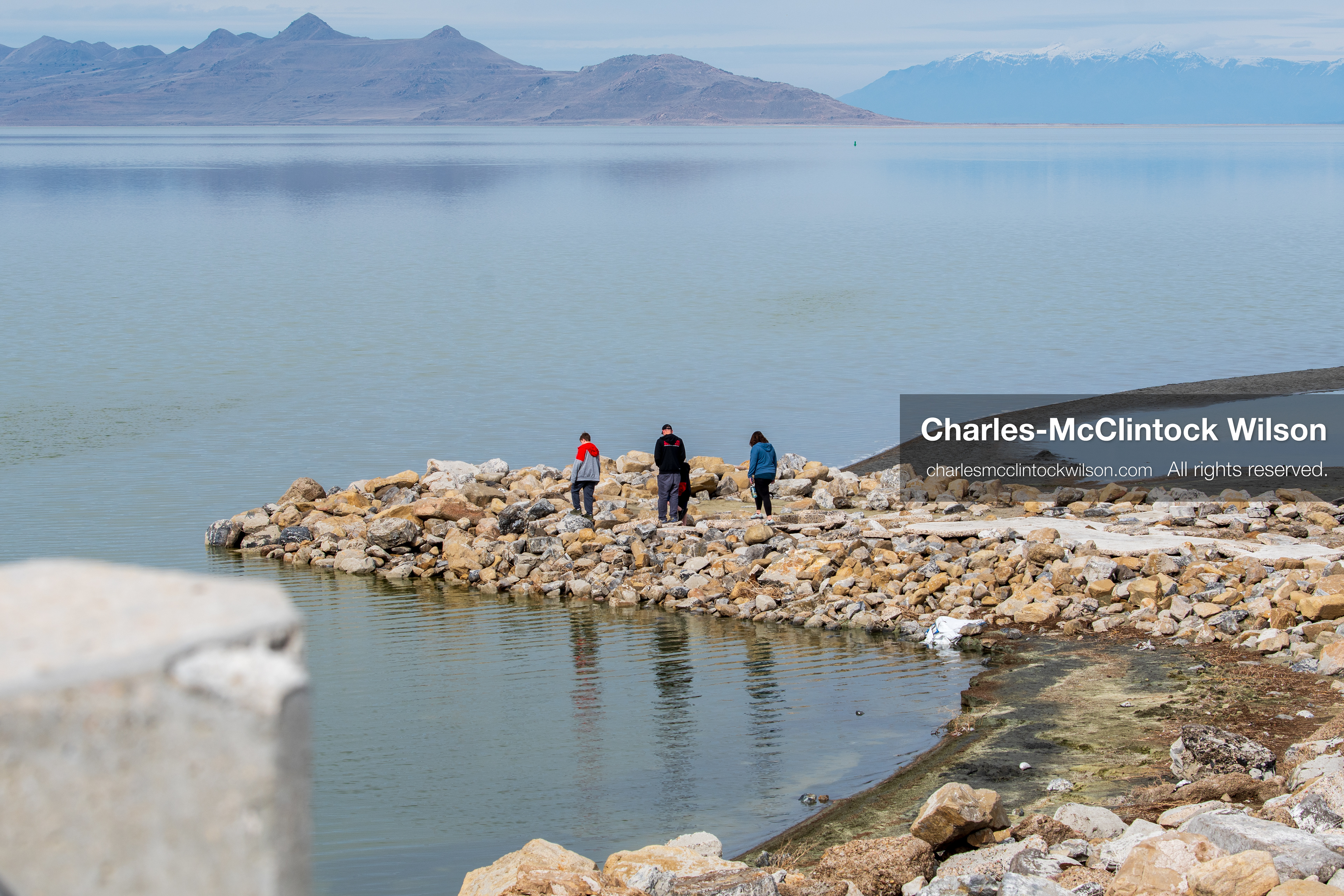 March 1, 2026, Great Salt Lake, Utah, USA: People walk along the shoreline of the Great Salt Lake as water levels remain historically low. Reports from state officials and the Great Salt Lake Strike Team state that the lake continues to fall within a serious adverse‑effects range, with elevations among the lowest recorded in more than one hundred years. The lake has drawn increased public attention as lawmakers consider large‑scale water projects and long‑term plans to address declining conditions. (Credit Image: © Charles‑McClintock Wilson/ZUMA Press Wire)