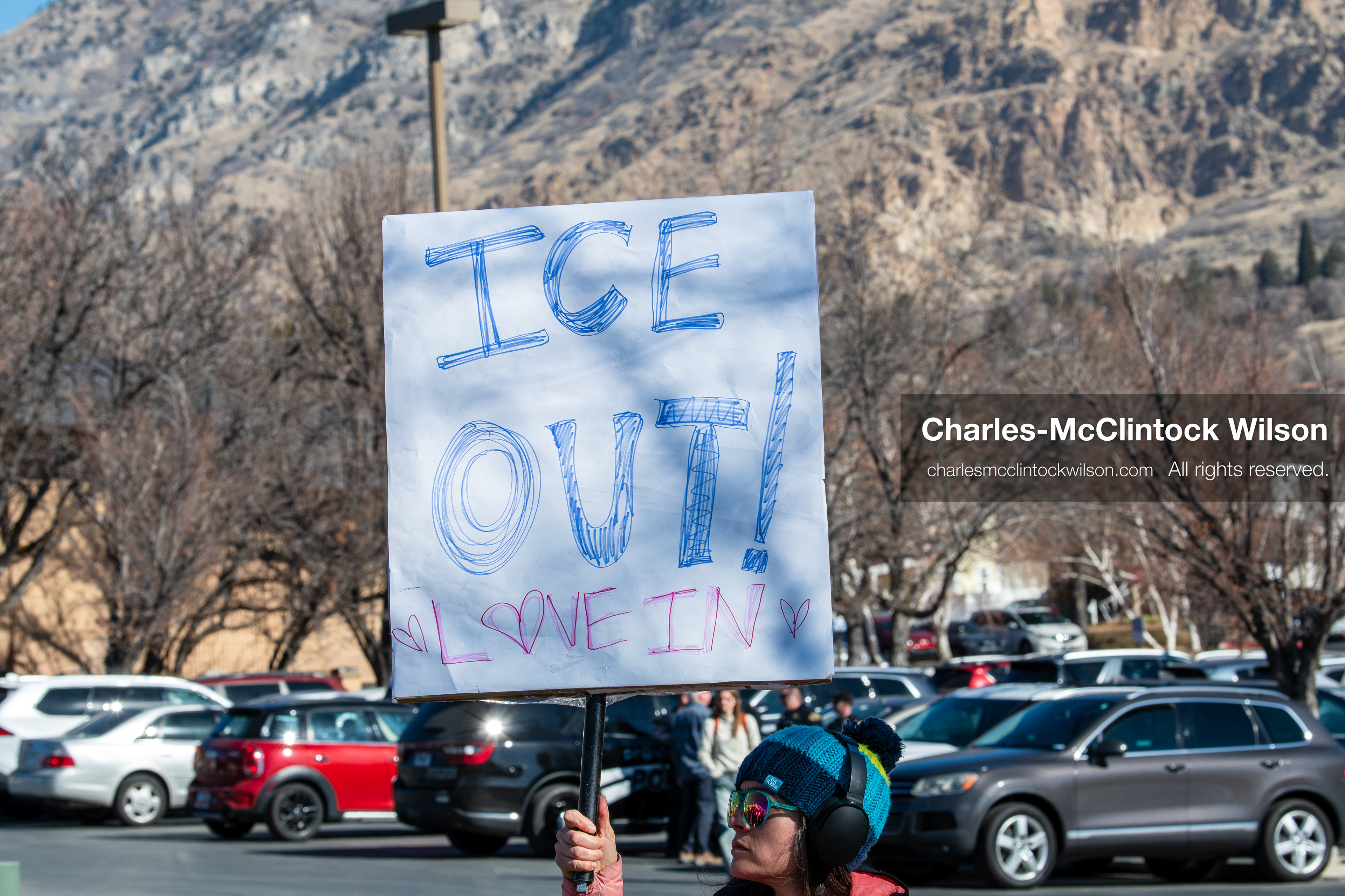 February 5, 2026, Provo, Utah, USA: A demonstrator holds a sign during a gathering near Brigham Young University in Provo where students and community members protested the presence of US Customs and Border Protection recruiters at a career fair held on the BYU campus. (Credit Image: © Charles McClintock Wilson/ZUMA Press Wire)
