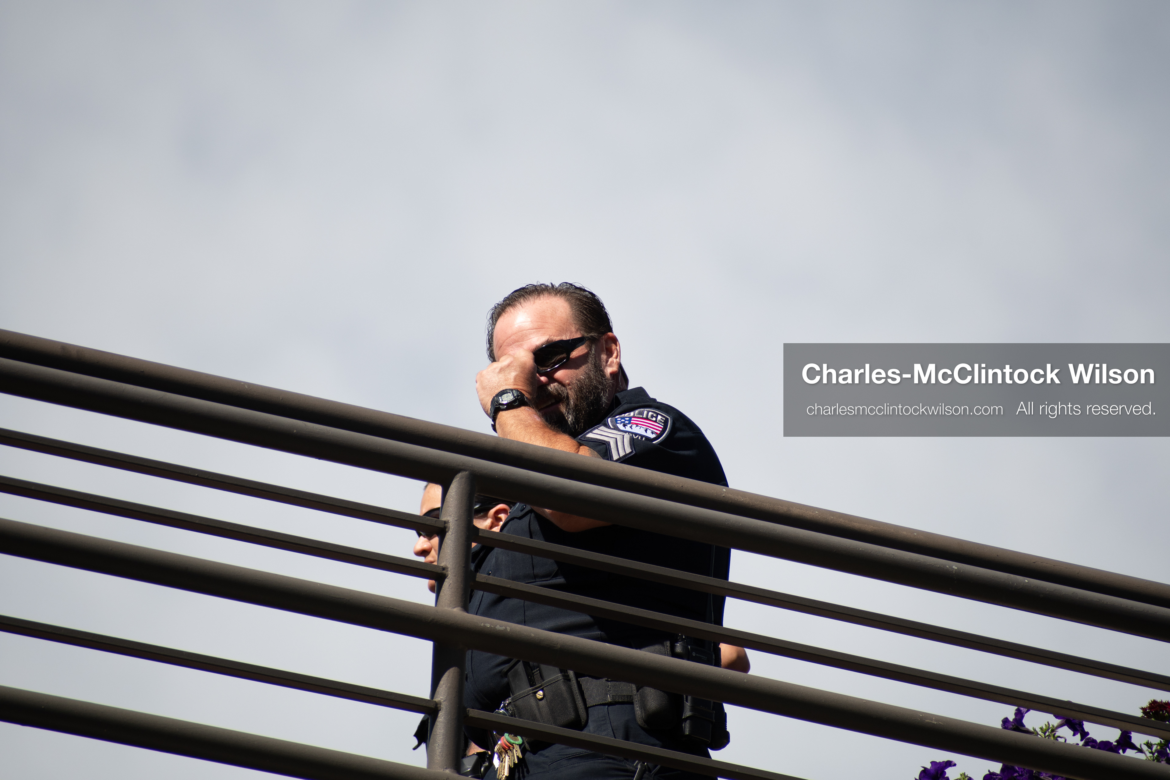 September 10, 2025 – Orem, Utah, United States: A Utah Valley University police officer maintains a security post on an elevated walkway ahead of a scheduled public event featuring conservative activist Charlie Kirk. Photograph by Charles‑McClintock Wilson / ZUMA Press Wire