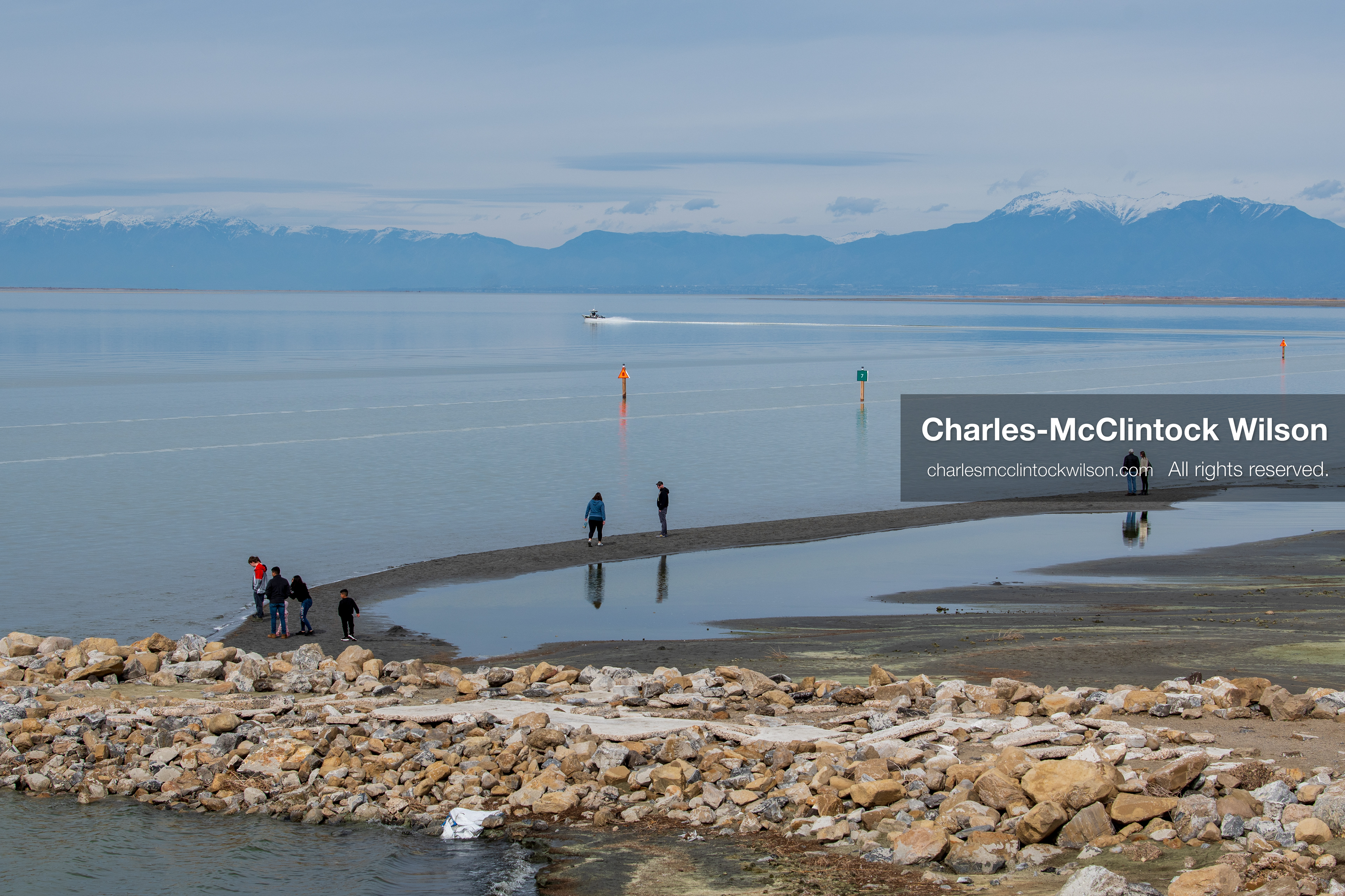 March 1, 2026, Great Salt Lake, Utah, USA: People walk along the shoreline of the Great Salt Lake as water levels remain historically low. Reports from state officials and the Great Salt Lake Strike Team state that the lake continues to fall within a serious adverse‑effects range, with elevations among the lowest recorded in more than one hundred years. The lake has drawn increased public attention as lawmakers consider large‑scale water projects and long‑term plans to address declining conditions. (Credit Image: © Charles‑McClintock Wilson/ZUMA Press Wire)