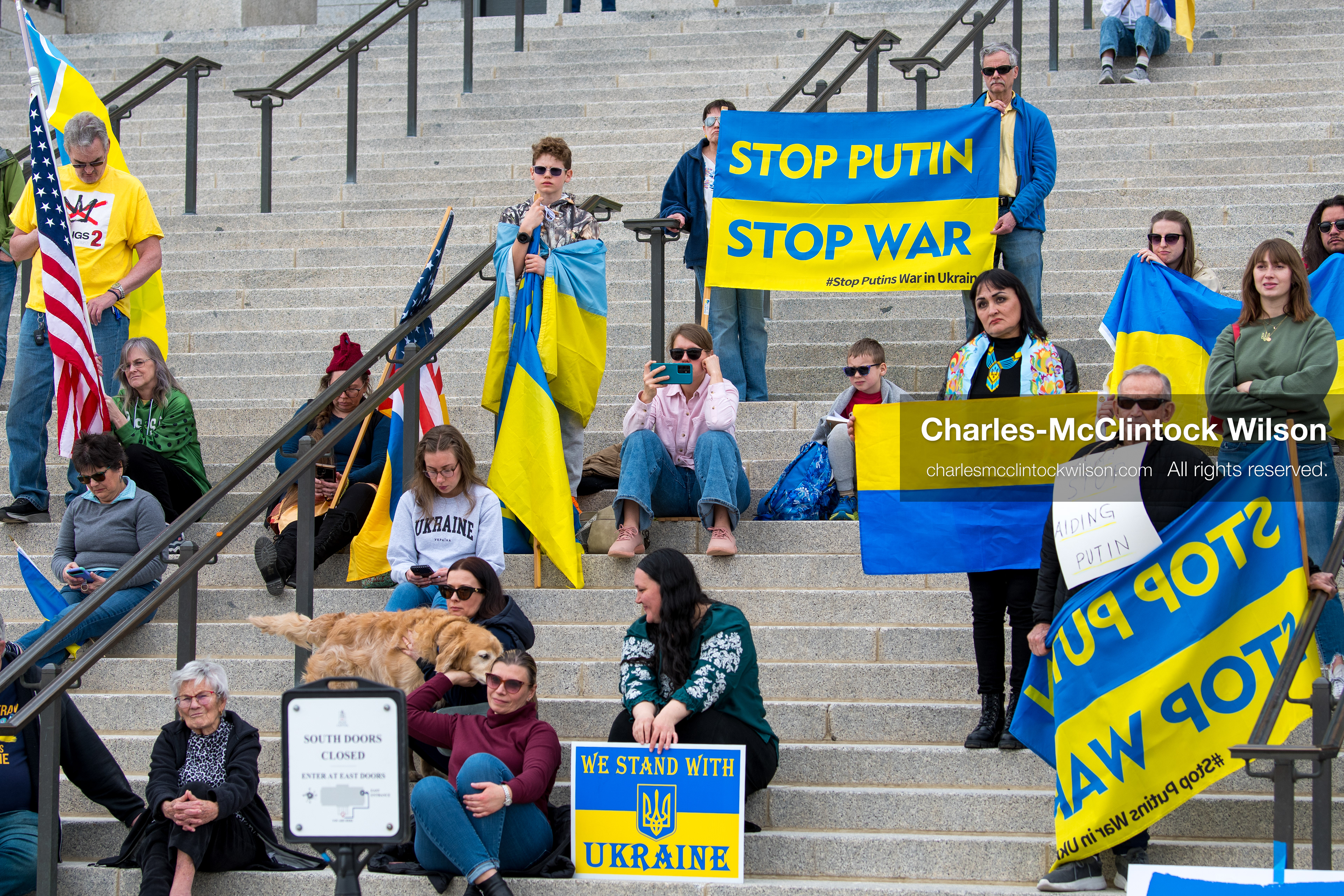 February 28, 2026, Salt Lake City, Utah, USA: Supporters gather on the steps of the Utah State Capitol during the Stand With Ukraine rally marking the four year anniversary of the full scale Russian invasion of Ukraine. Participants hold signs and Ukrainian flags as community members call for continued support for Ukraine and an end to the war. (Credit Image: © Charles McClintock Wilson/ZUMA Press Wire)