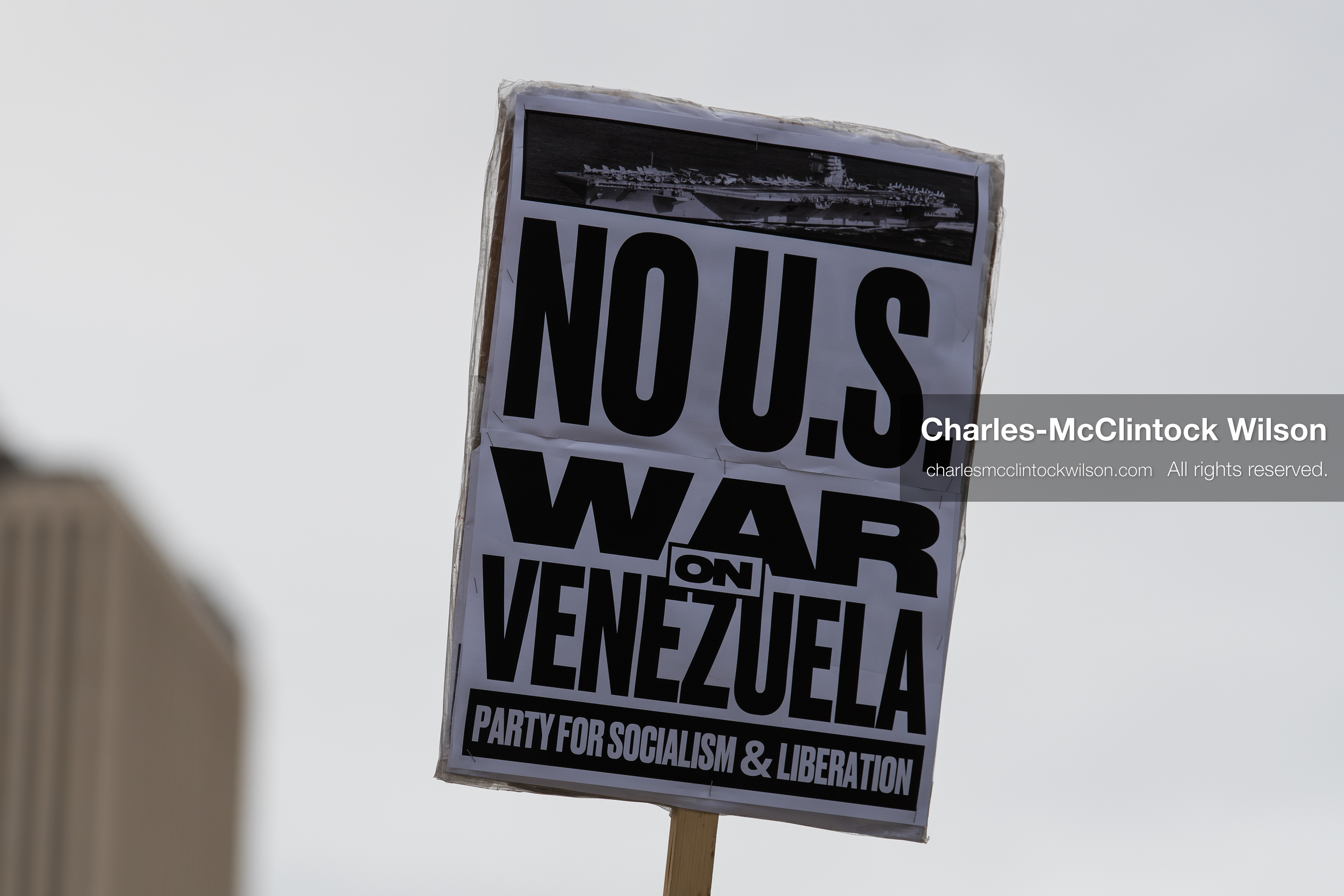 January 3, 2026, Salt Lake City, Utah, USA: A protester holds a sign during a demonstration against US action in Venezuela outside the Wallace Federal Building in Salt Lake City, Utah. The protest was part of a nationwide mobilization responding to recent military developments. (Credit Image: (c) Charles‑McClintock Wilson/ZUMA Press Wire)