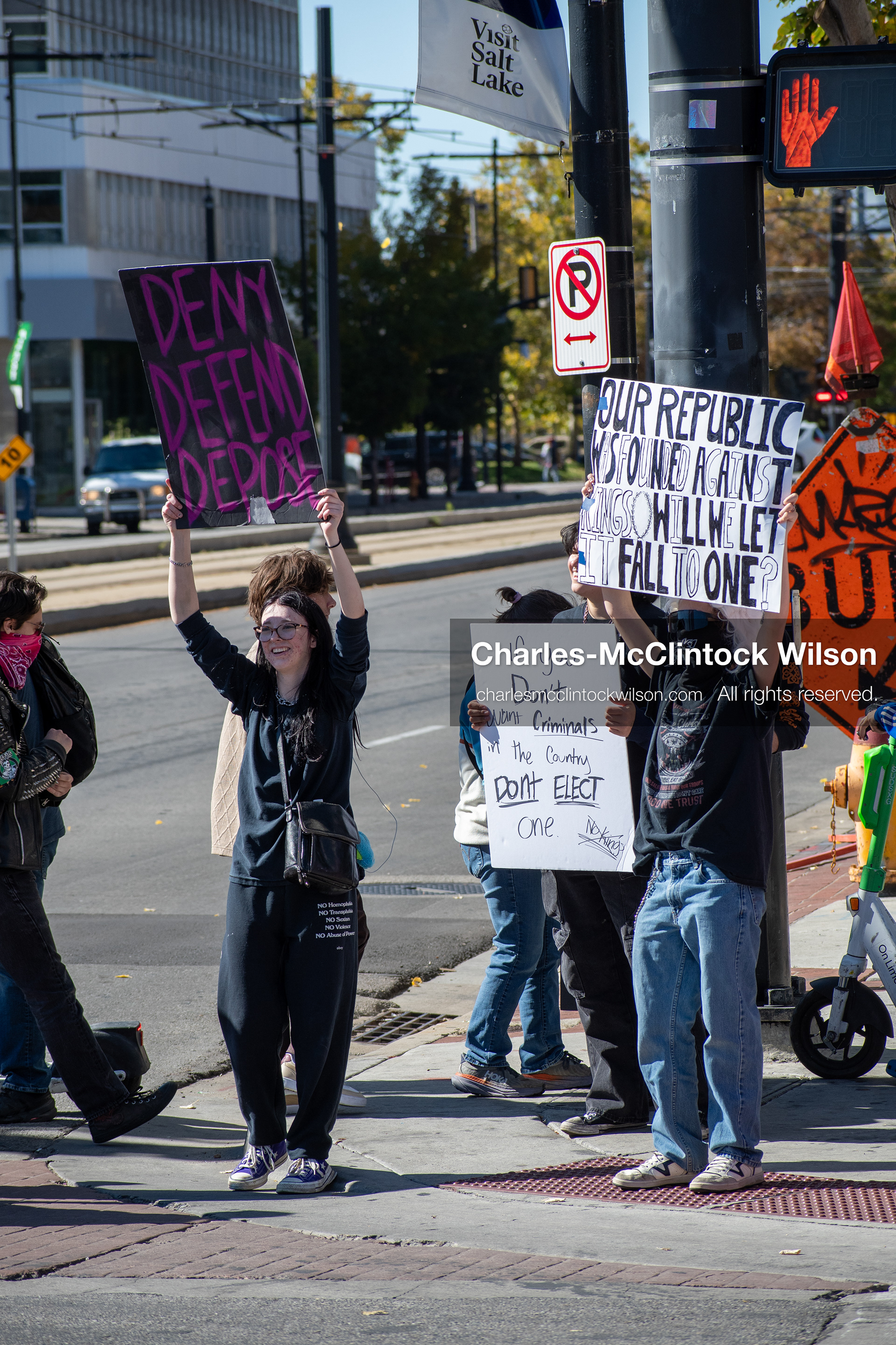 October 18, 2025, Salt Lake City, Utah, USA: Demonstrators march along South State Street during a "No Kings" protest in Salt Lake City, Utah. The protest was part of a nationwide mobilization.