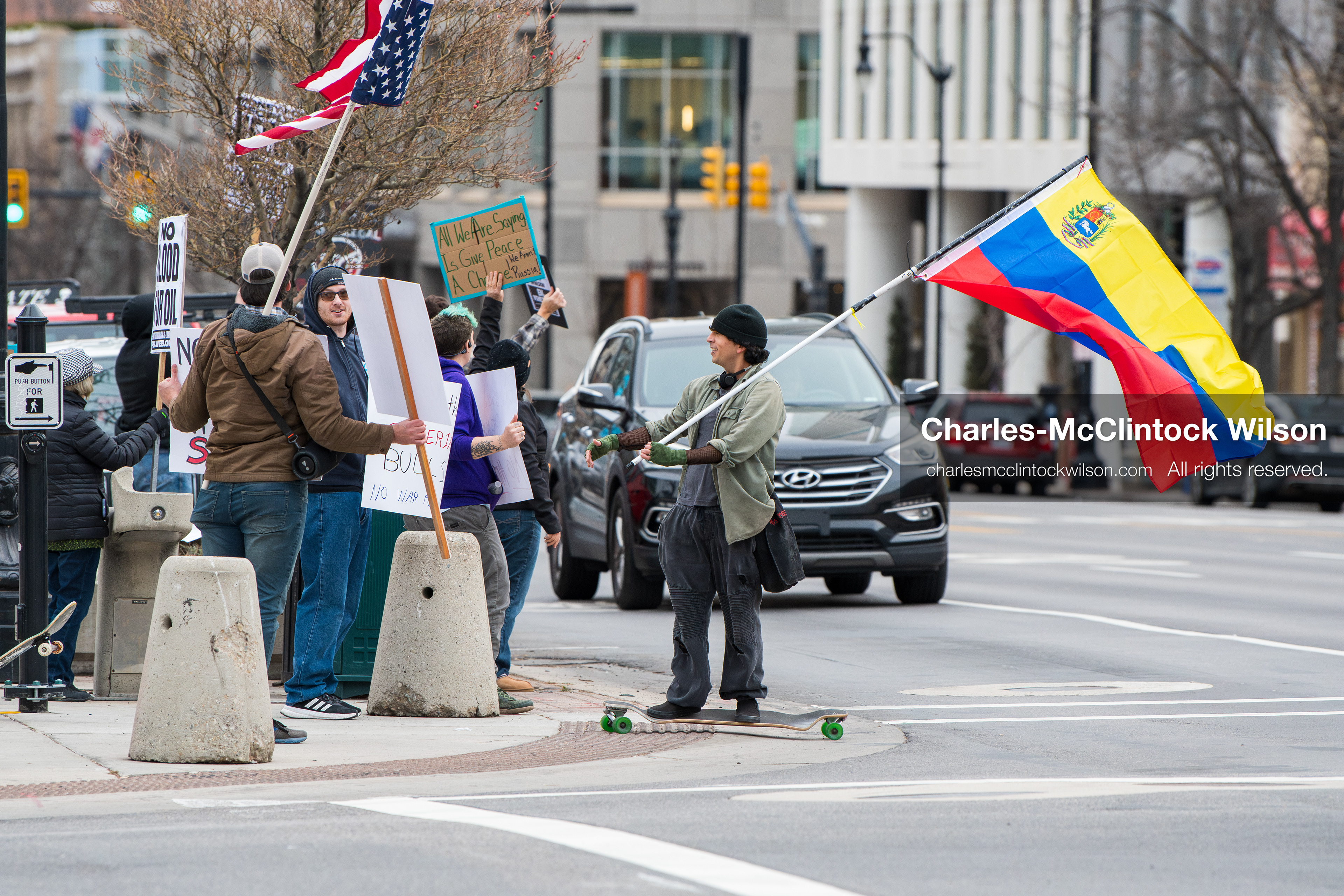 January 3, 2026, Salt Lake City, Utah, USA: Protesters hold signs and flags, including the Venezuelan flag, during a demonstration against US action in Venezuela outside the Wallace Federal Building in Salt Lake City, Utah. The protest was part of a nationwide mobilization responding to recent military developments. (Credit Image: (c) Charles‑McClintock Wilson/ZUMA Press Wire)