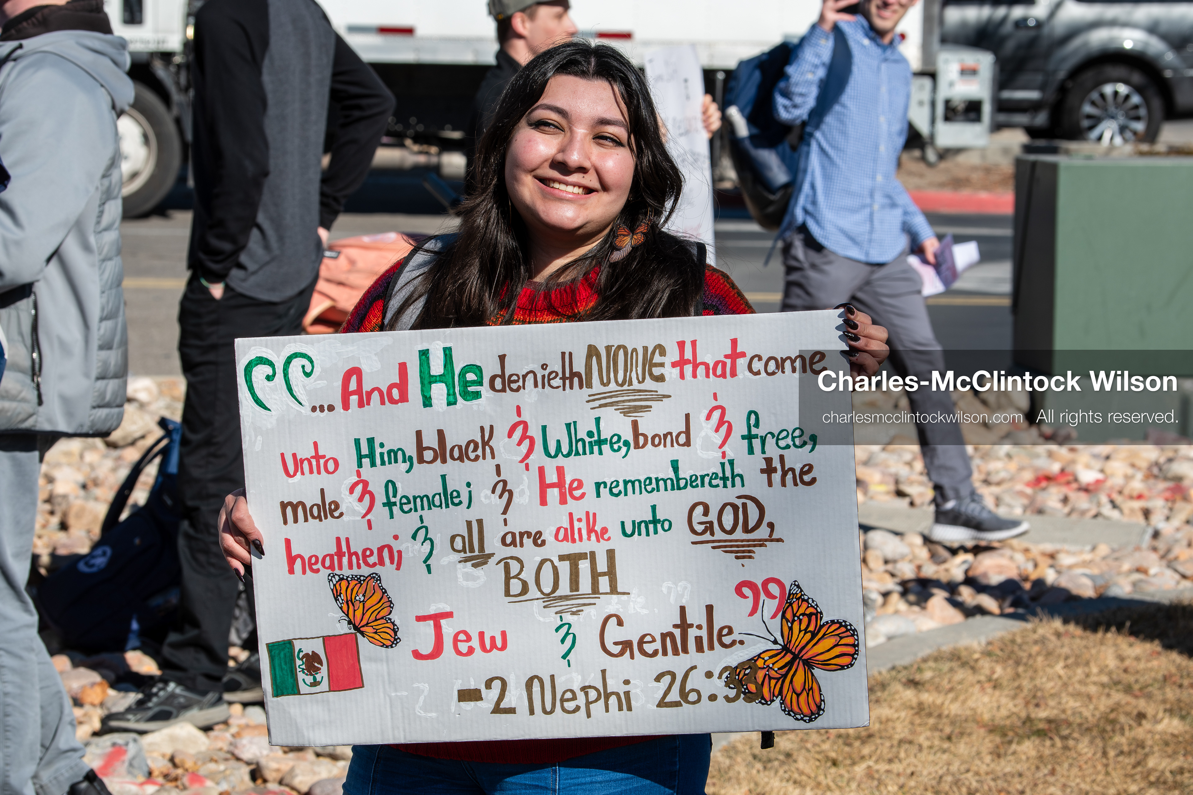 February 5, 2026, Provo, Utah, USA: A demonstrator holds a sign during a gathering near Brigham Young University in Provo where students and community members protested the presence of US Customs and Border Protection recruiters at a career fair held on the BYU campus. (Credit Image: © Charles McClintock Wilson/ZUMA Press Wire)