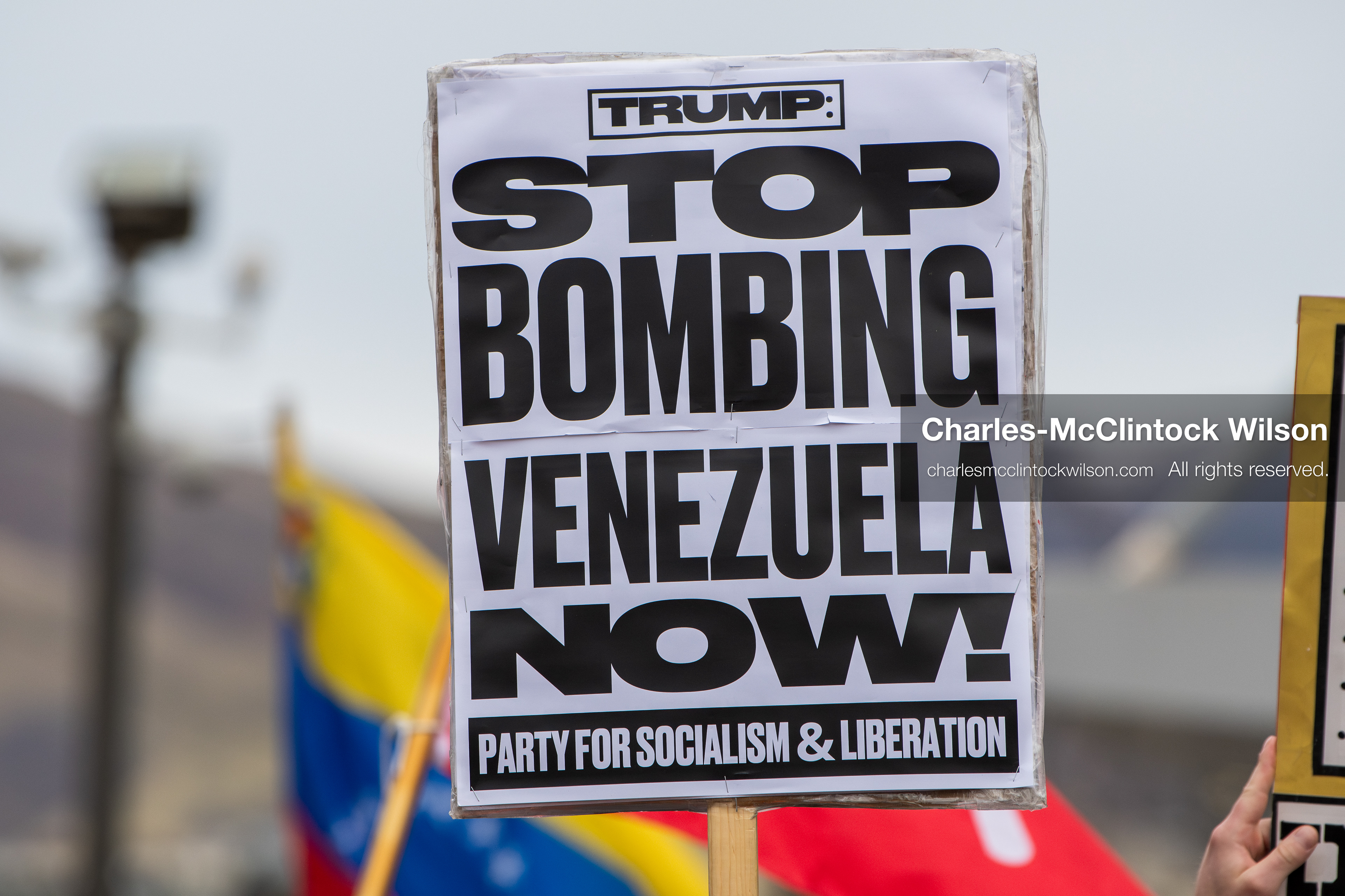 January 3, 2026, Salt Lake City, Utah, USA: A protester holds a sign during a demonstration against US action in Venezuela outside the Wallace Federal Building in Salt Lake City, Utah. The protest was part of a nationwide mobilization responding to recent military developments. (Credit Image: (c) Charles‑McClintock Wilson/ZUMA Press Wire)