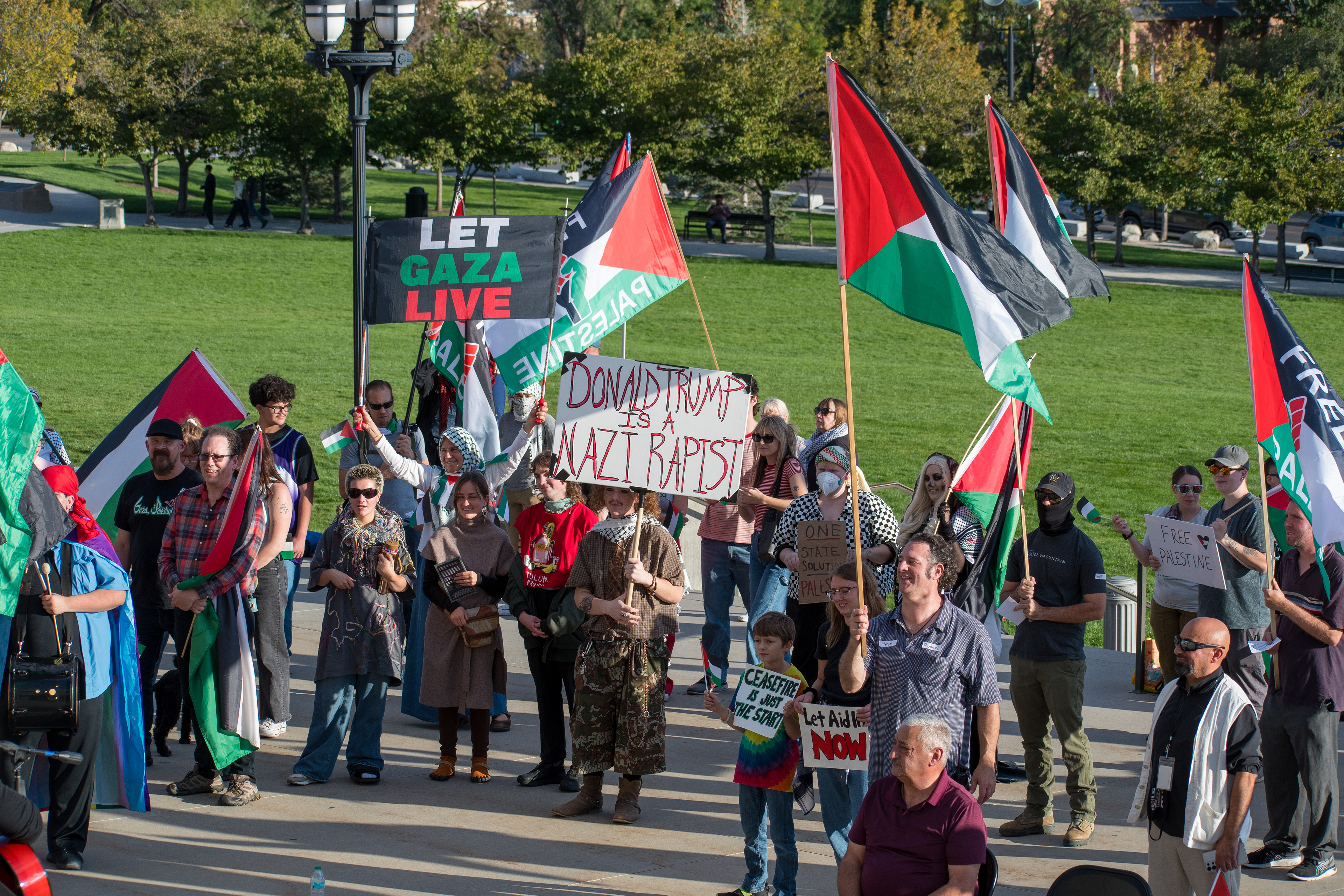 October 10, 2025, Salt Lake City, Utah, USA: Pro-Palestine demonstrators gather in front of the Utah State Capitol during the Free Palestine Rally. Participants hold flags and signs as part of the public demonstration. (Credit Image: © Charles-McClintock Wilson/ZUMA Press Wire)