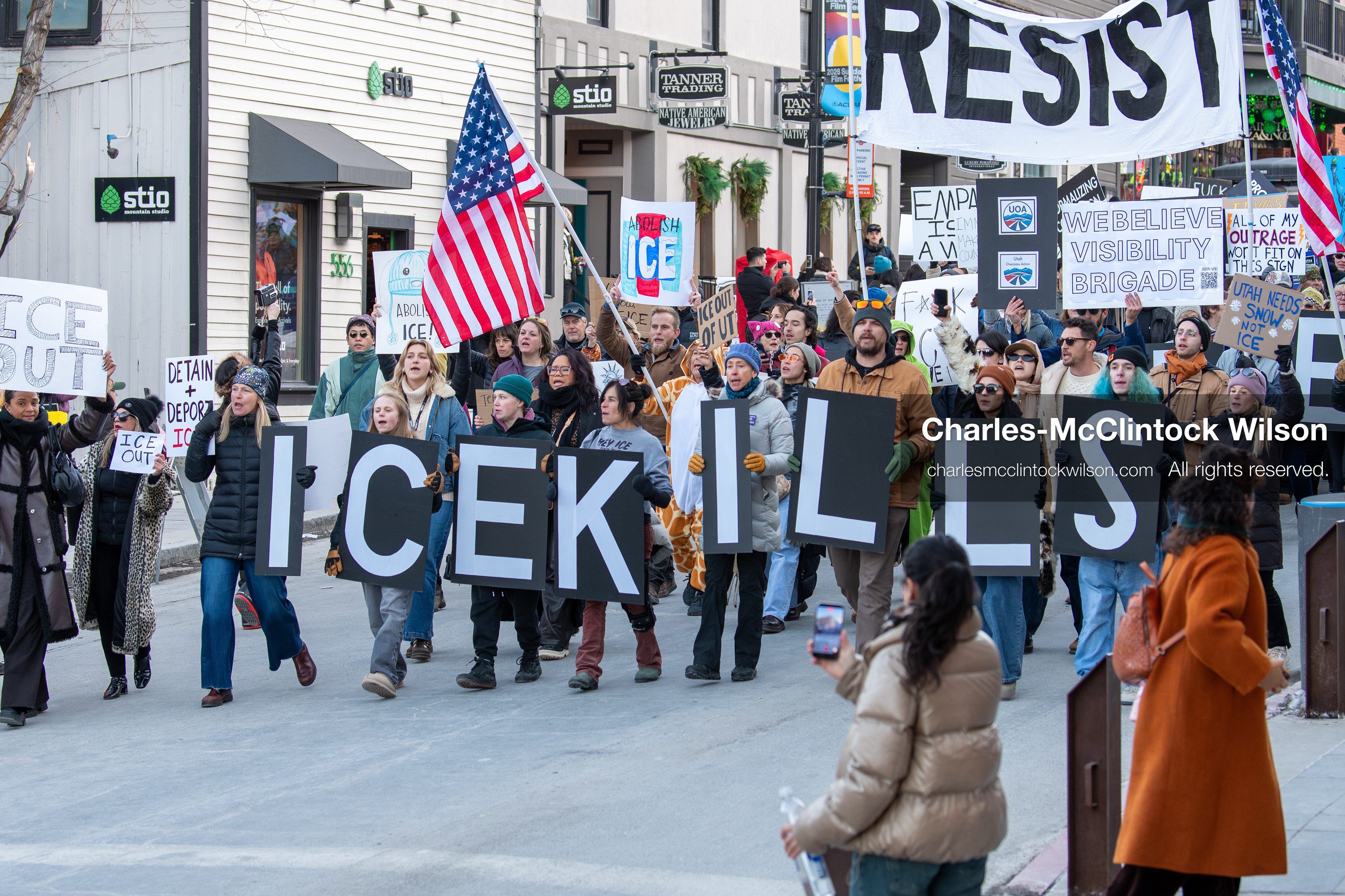 January 26, 2026, Park City, Utah, USA: Demonstrators march through Main Street holding signs during a protest opposing U.S. Immigration and Customs Enforcement (I.C.E.) ICE agents at the Sundance Film Festival in Park City, Utah, on Monday, Jan. 26, 2026. The event was held in response to the fatal shooting of Alex Pretti by a U.S. Border Patrol officer in Minneapolis. (Credit Image: © Charles McClintock Wilson/ZUMA Press Wire)