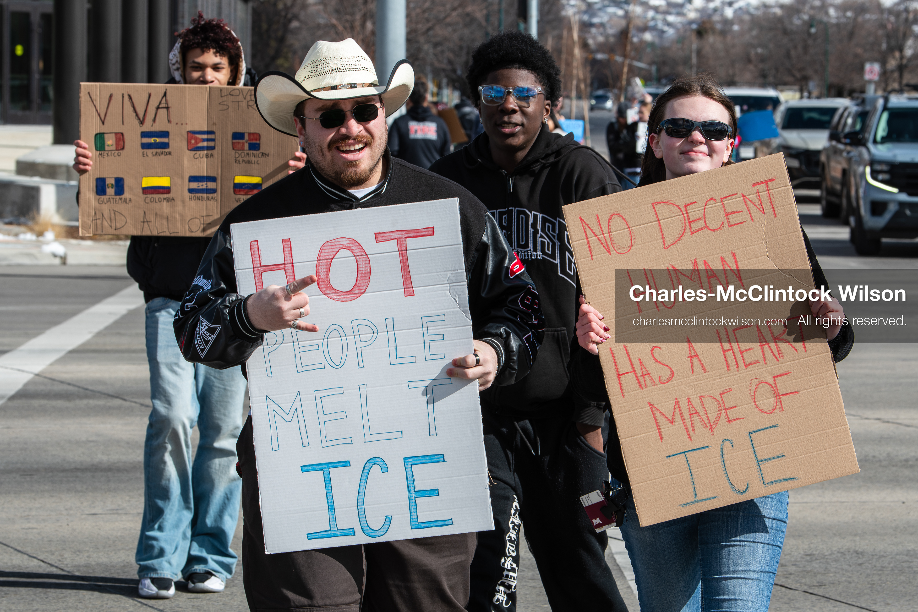 February 20, 2026, Orem, Utah, USA: Participants cross State Street in front of Orem City Hall during a student led protest against ICE. Demonstrators move through the crosswalk as vehicles wait in the area. (Credit Image: © Charles McClintock Wilson/ZUMA Press Wire)