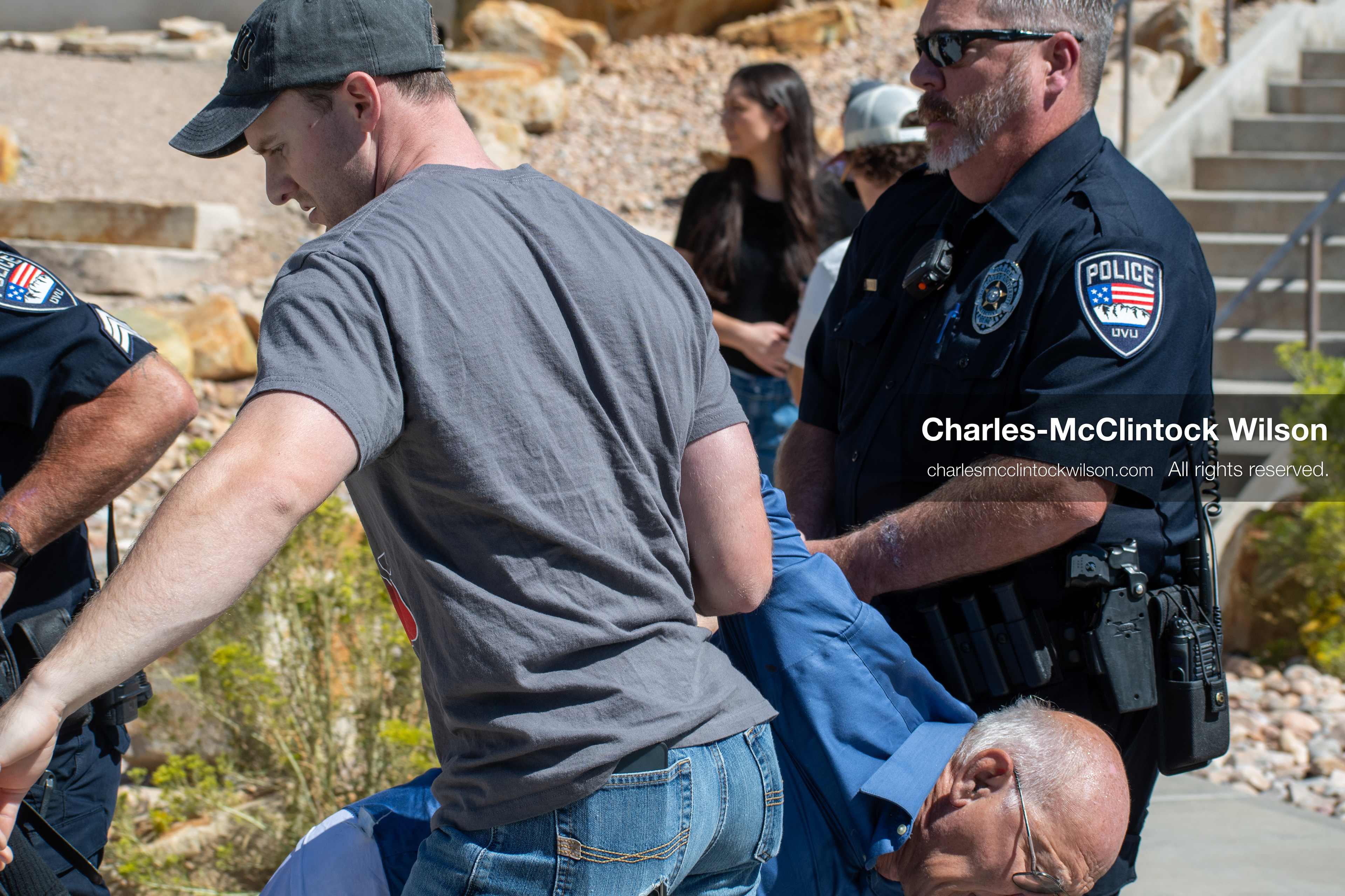 September 10, 2025, Orem, Utah, USA: George Zinn is taken into custody by campus security following the fatal shooting of Charlie Kirk during a public event at Utah Valley University. At the time of the arrest, Zinn was identified as the alleged shooter. He was later released and subsequently arrested on unrelated charges. Law enforcement confirmed that the actual suspect remained at large during this initial response. (Credit Image: © Charles-McClintock Wilson/ZUMA Press Wire)