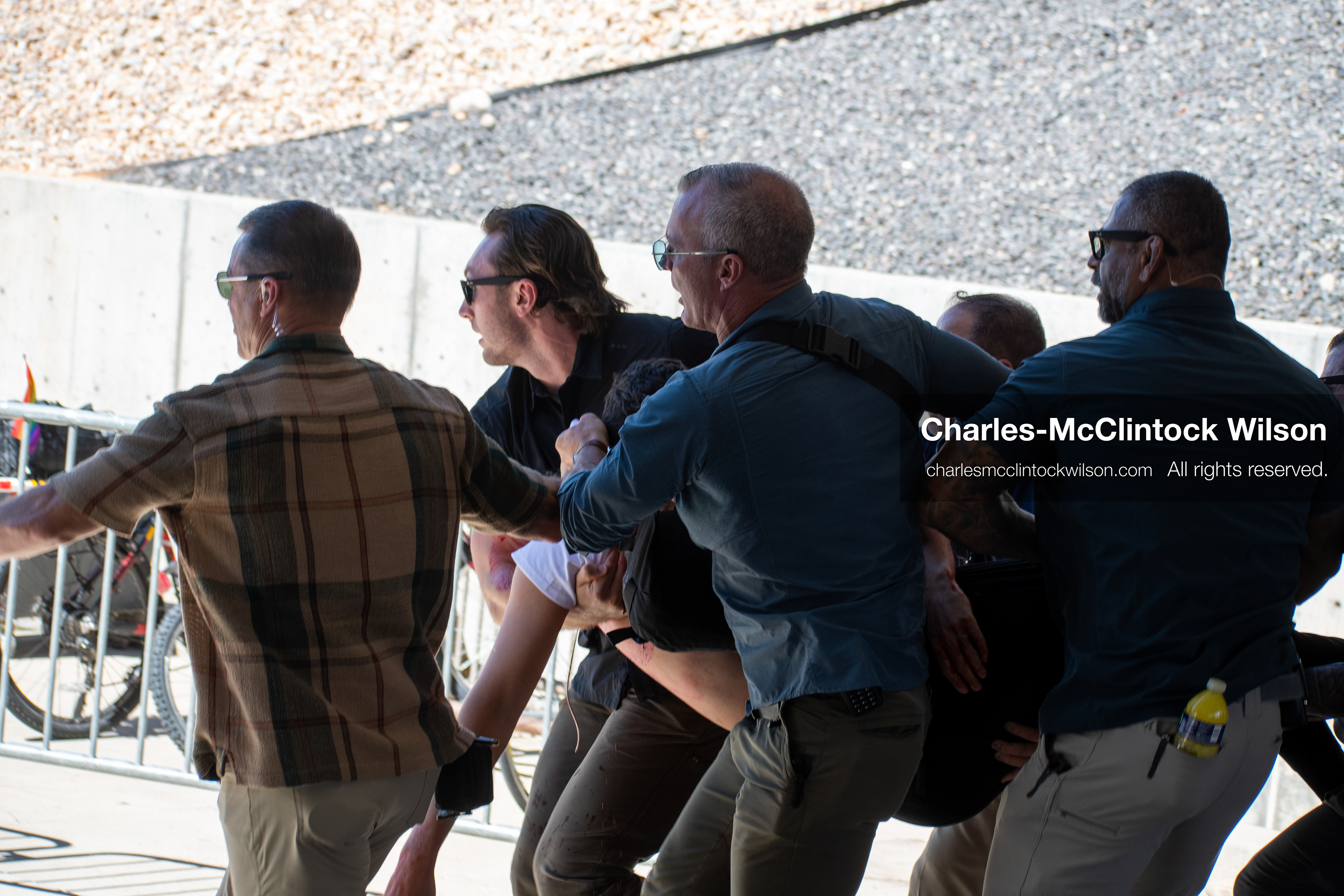 September 10, 2025, Orem, Utah, USA: American right-wing pundit Charlie Kirk, 31, the CEO and co-founder of the conservative youth organization Turning Point USA, hand dangles as he is being carried by security officers after he was shot Wednesday during an event at Utah Valley University. Kirk, a close ally of President Trump, was killed while speaking in front of a large crowd at Utah Valley University. (Credit Image: © Charles-McClintock Wilson/ZUMA Press Wire)