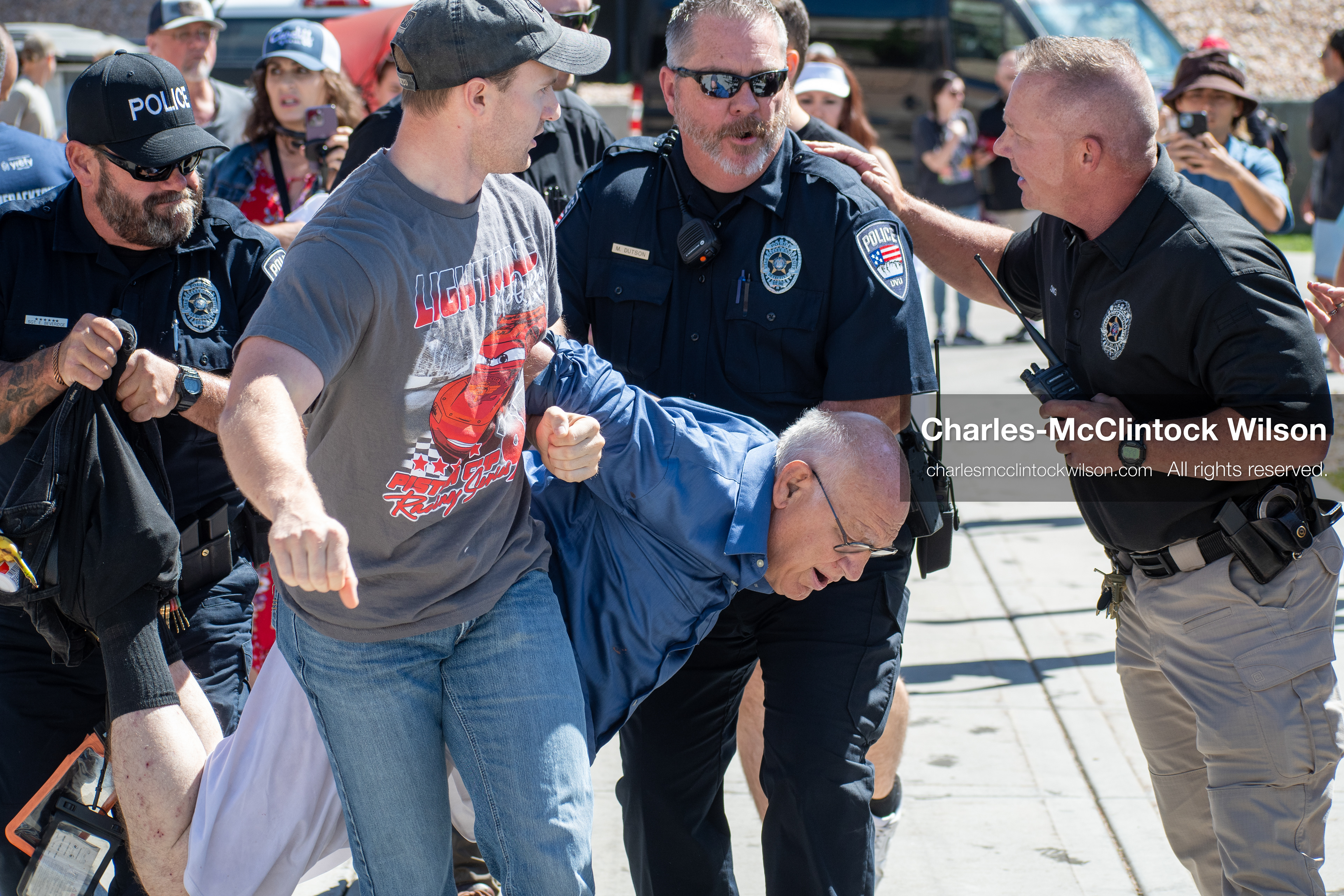 September 10, 2025, Orem, Utah, USA: George Zinn is taken into custody by campus security following the fatal shooting of Charlie Kirk during a public event at Utah Valley University. At the time of the arrest, Zinn was identified as the alleged shooter. He was later released and subsequently arrested on unrelated charges. Law enforcement confirmed that the actual suspect remained at large during this initial response. (Credit Image: © Charles-McClintock Wilson/ZUMA Press Wire)