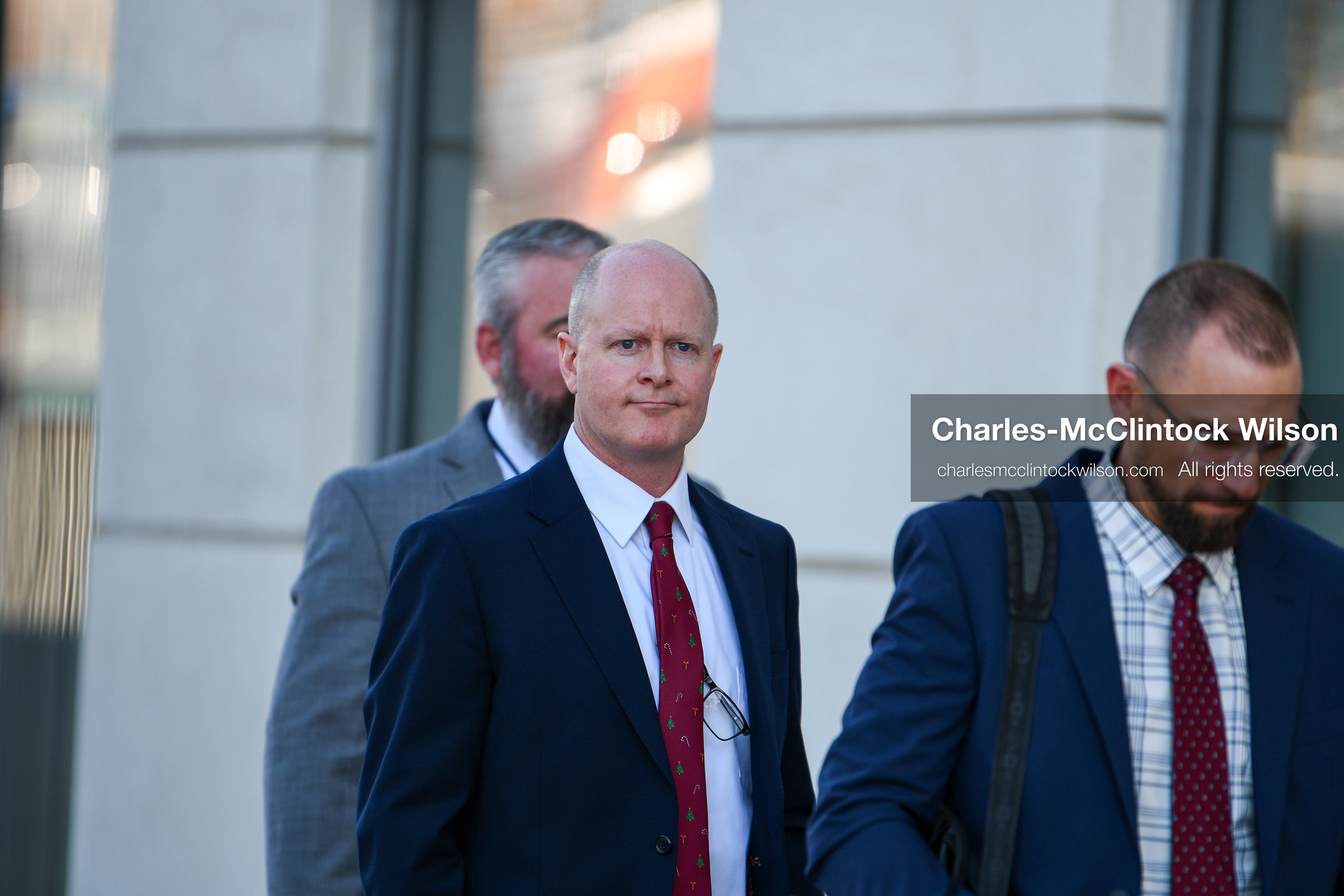 PROVO, UTAH, USA – DECEMBER 11, 2025: Chad Grunander, center, a prosecutor with the Utah County Attorney’s Office, arrives at the Fourth District Court in Provo for the first in‑person court appearance of Tyler Robinson in the Charlie Kirk murder case. (Credit Image: © Charles‑McClintock Wilson/ZUMA Press Wire)